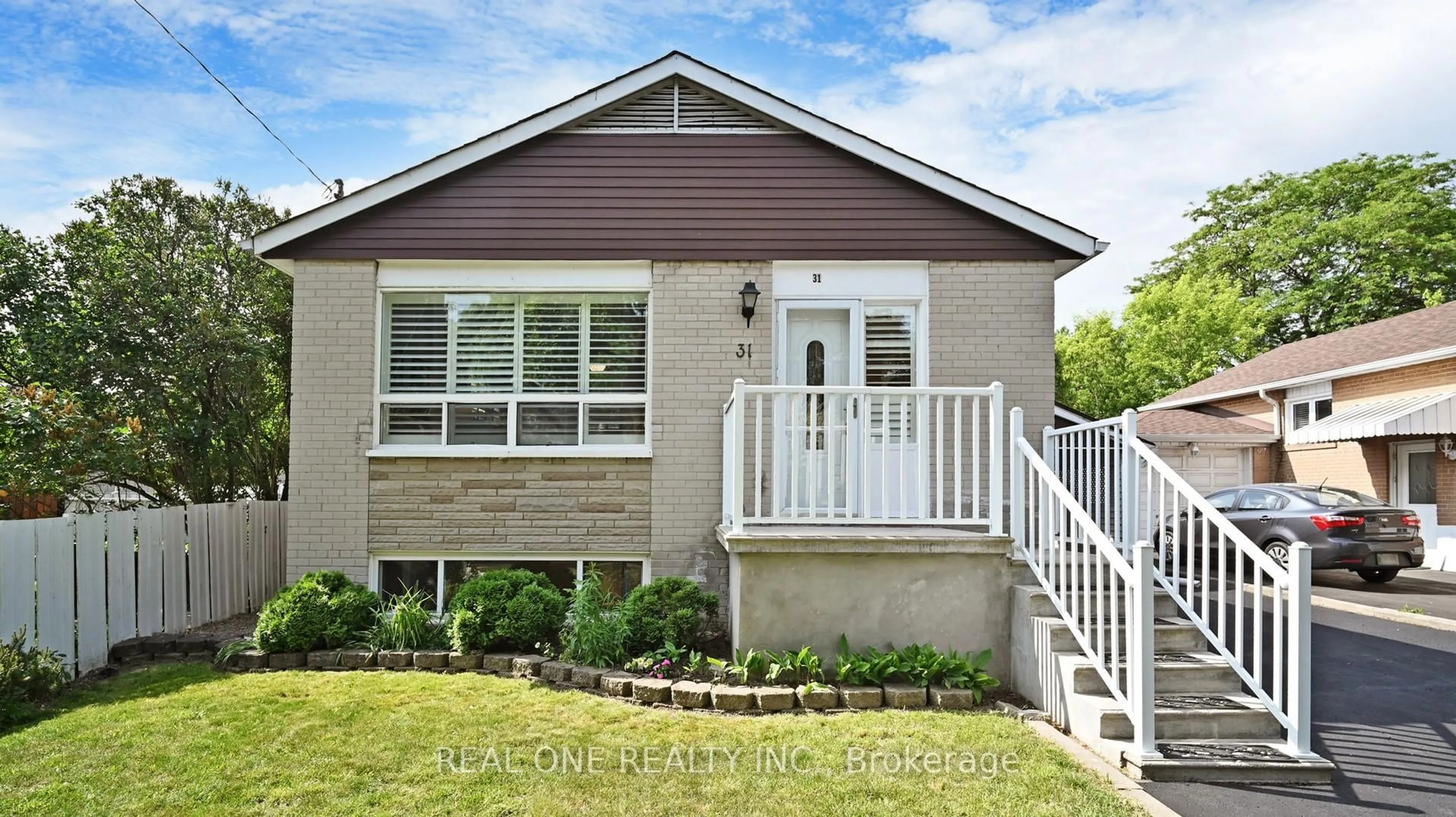 Home with vinyl exterior material, street for 31 Wellesworth Dr, Toronto Ontario M9C 4P8