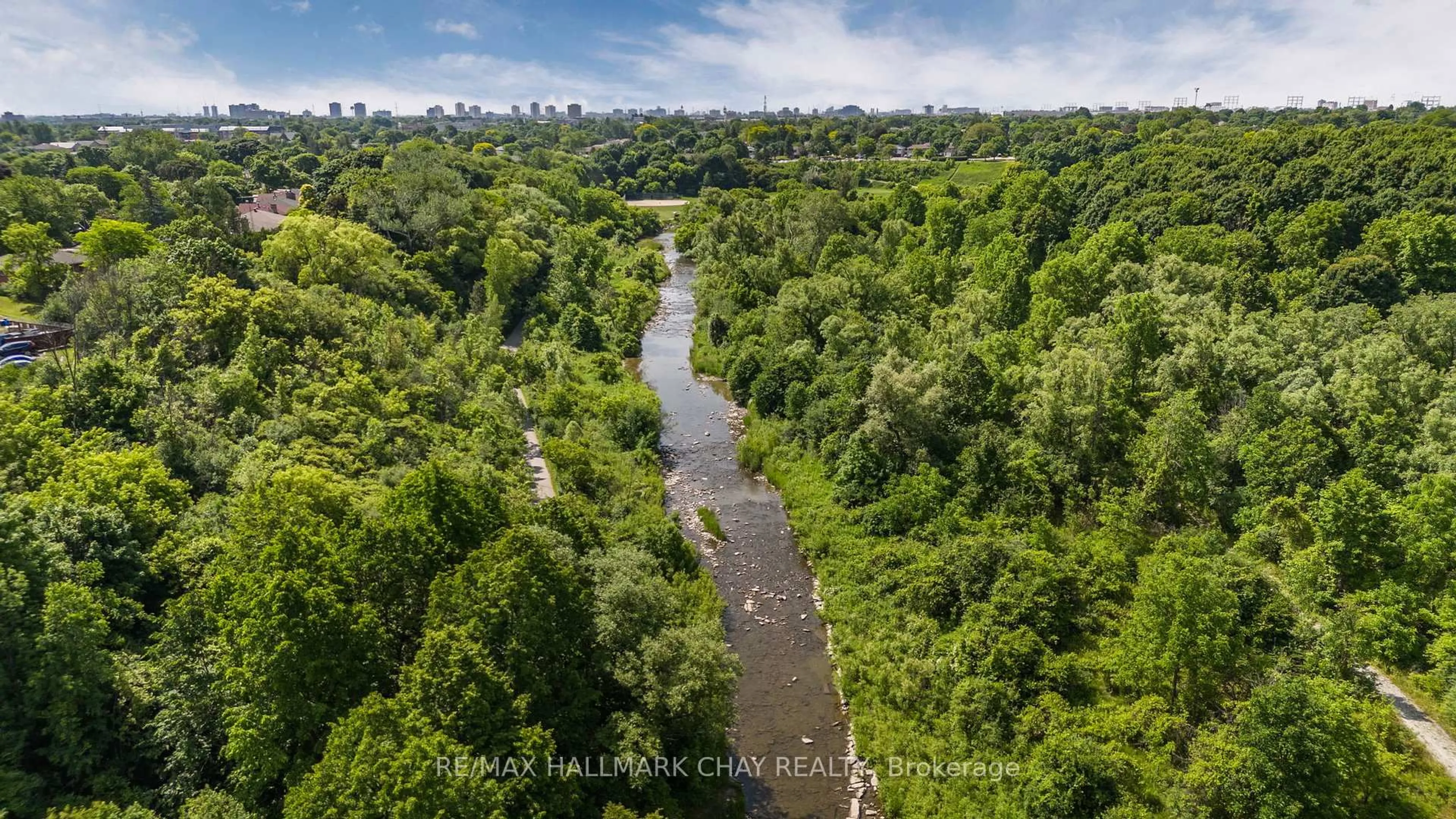 A pic from outside/outdoor area/front of a property/back of a property/a pic from drone, water/lake/river/ocean view for 80 Esther Lorrie Dr #411, Toronto Ontario M9W 0C6