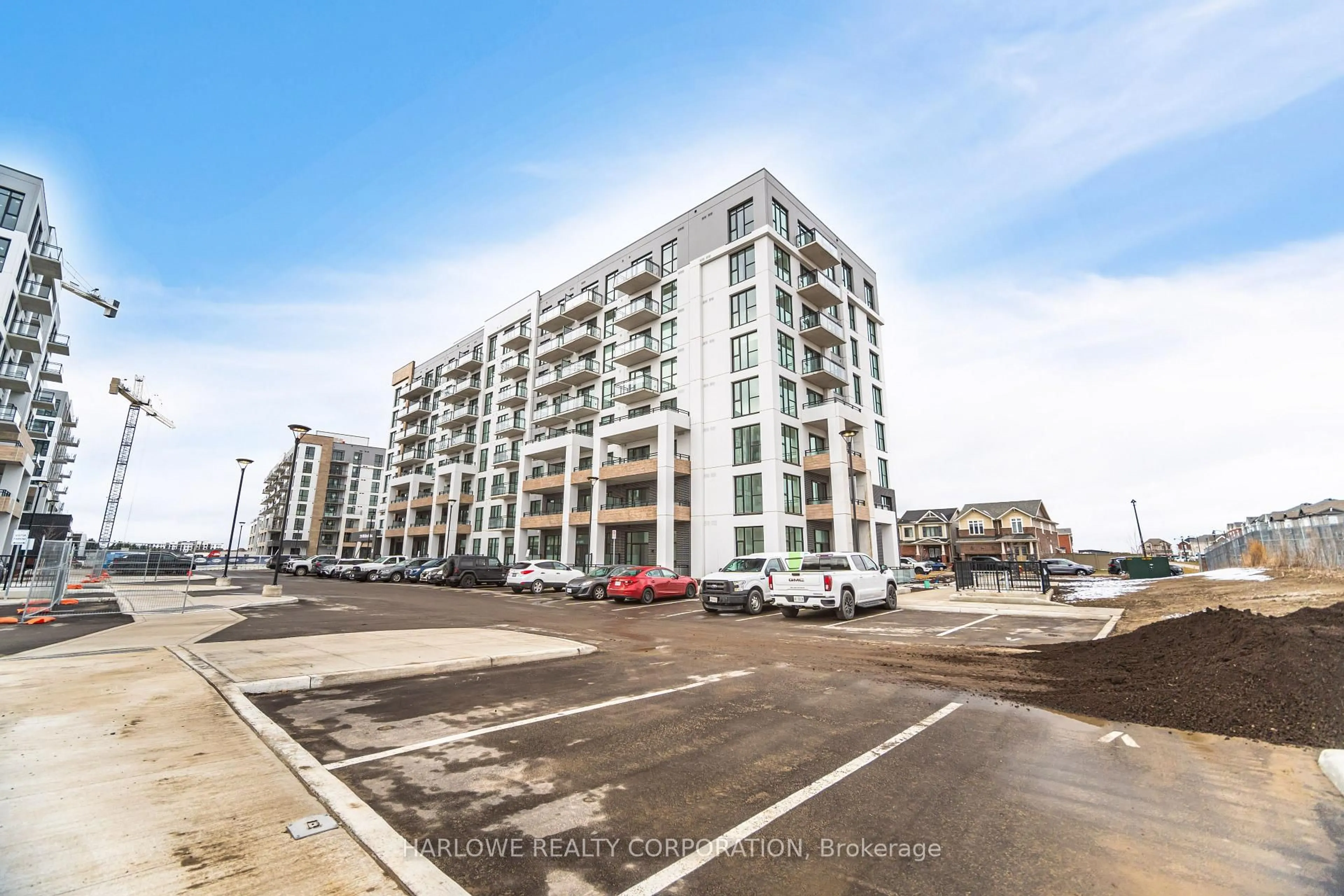 A pic from outside/outdoor area/front of a property/back of a property/a pic from drone, building for 770 Whitlock Ave #306, Milton Ontario L9E 1S2