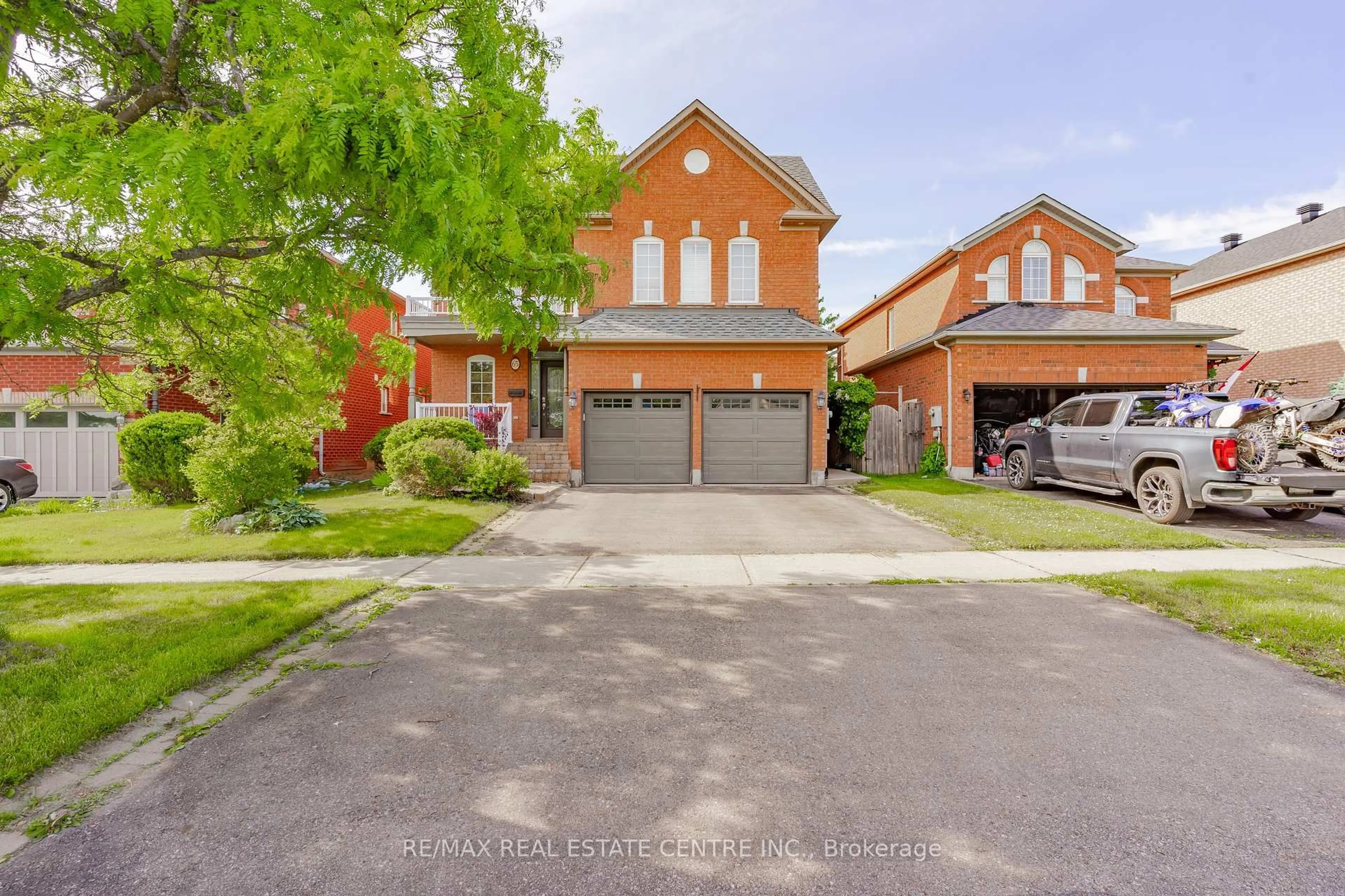 Home with brick exterior material, street for 65 Berton Blvd, Halton Hills Ontario L7G 6C7