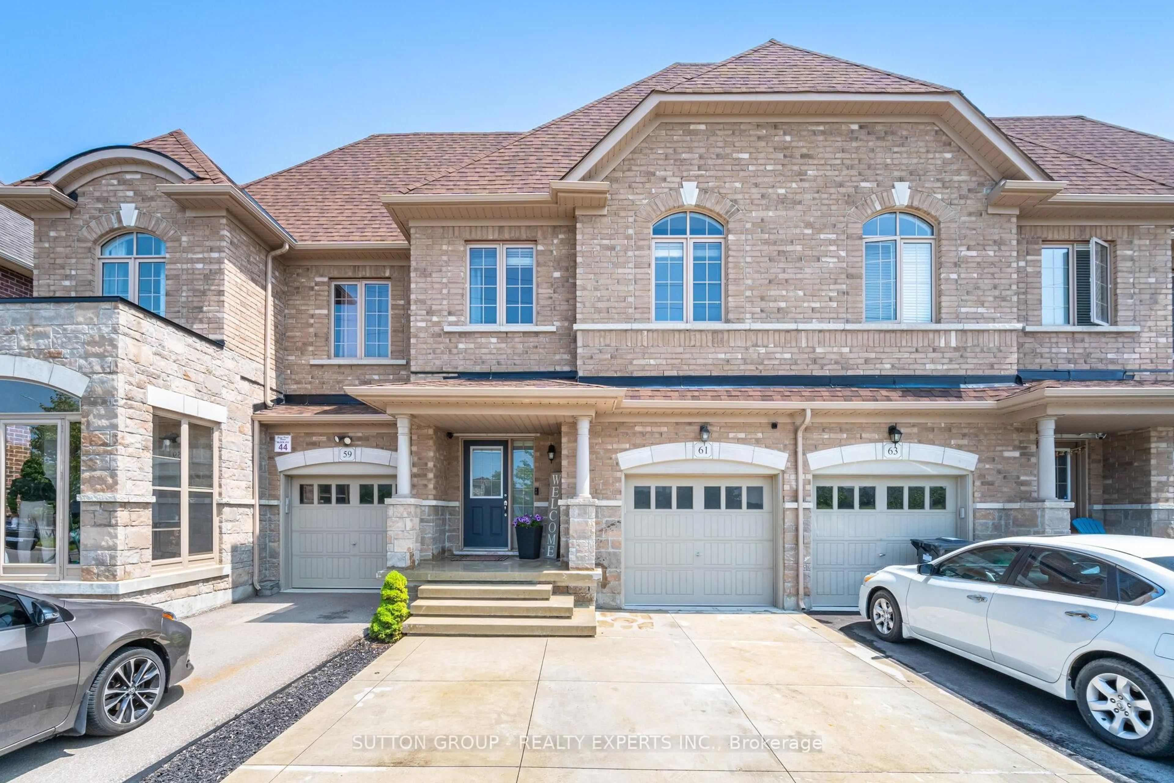 Home with brick exterior material, street for 61 Agava St, Brampton Ontario L7A 4R9