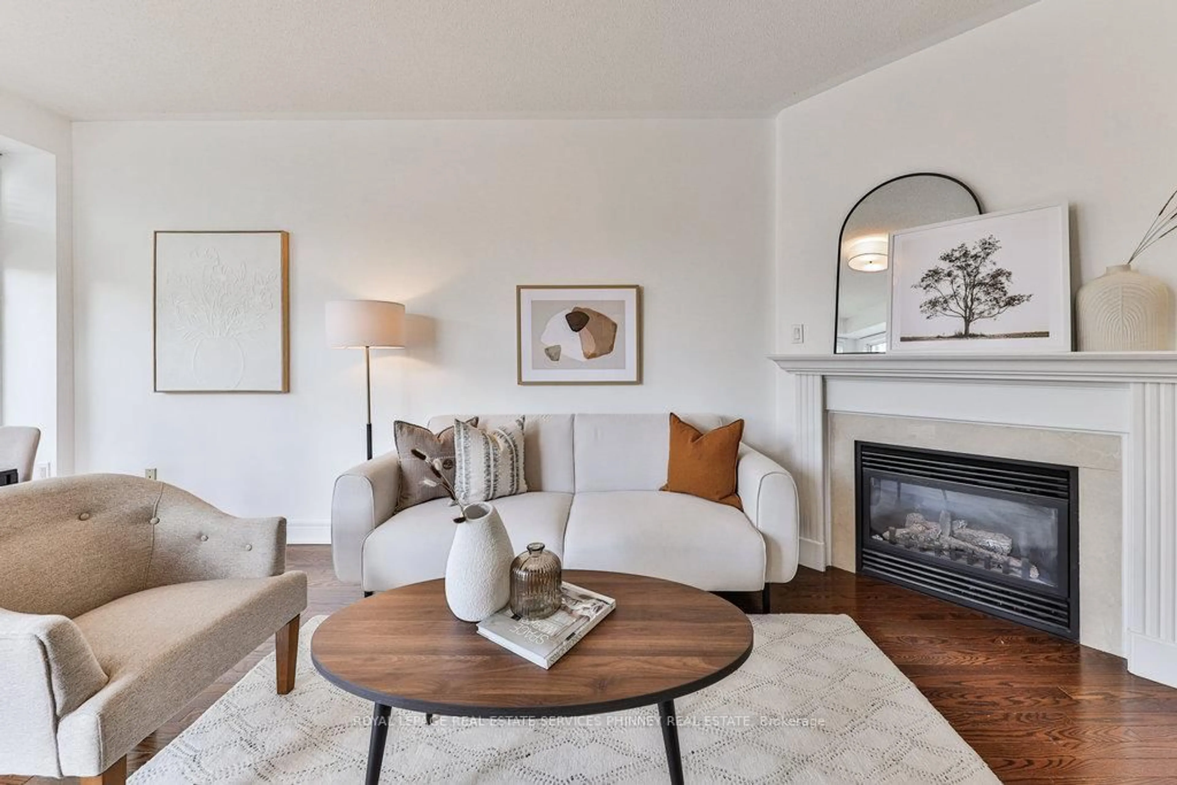 Living room with furniture, wood/laminate floor for 2032 Lakeshore Rd, Mississauga Ontario L5J 1J8