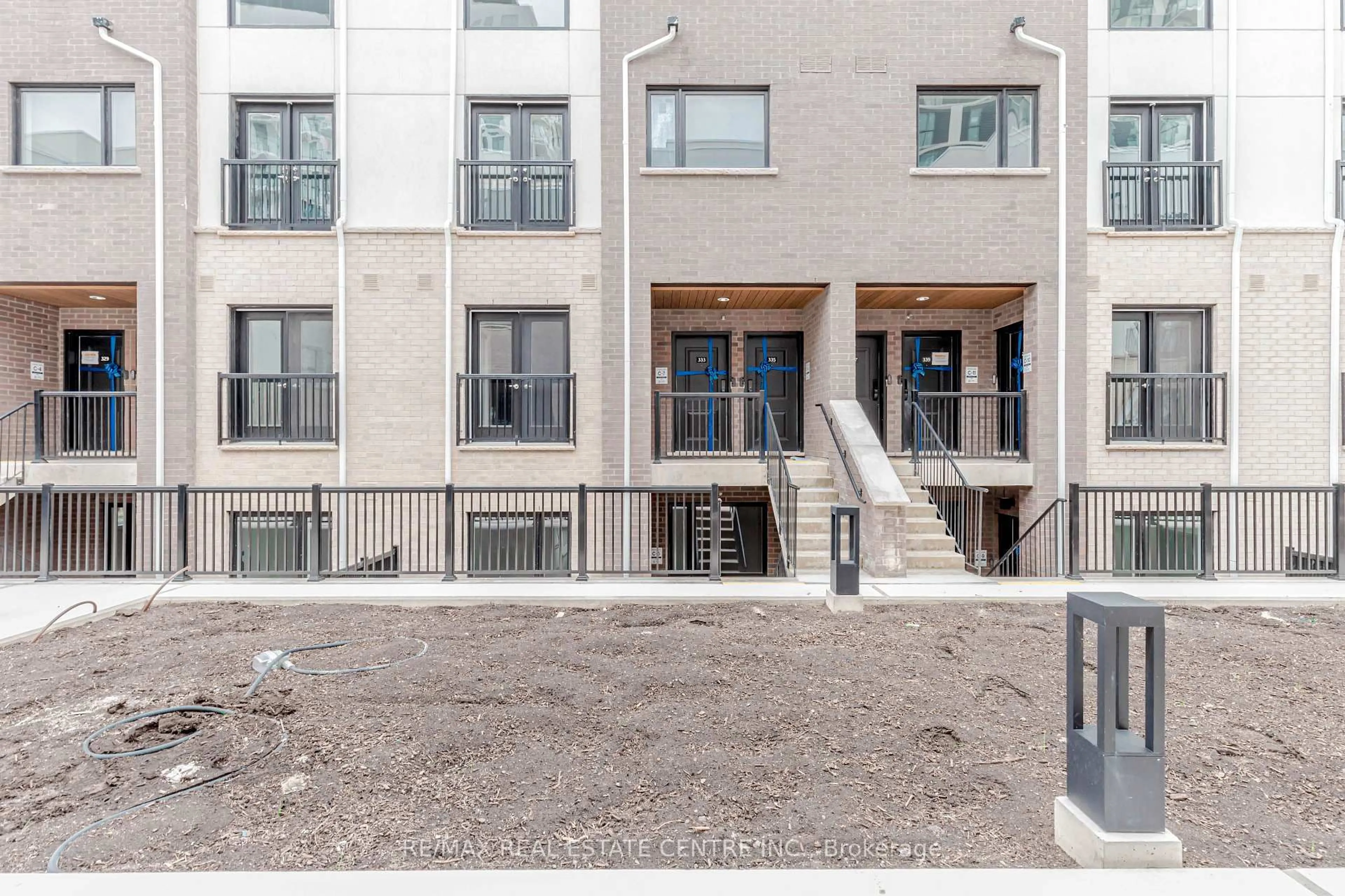 Patio, street for 349 Wheat Boom Dr #117, Oakville Ontario L6H 7X5