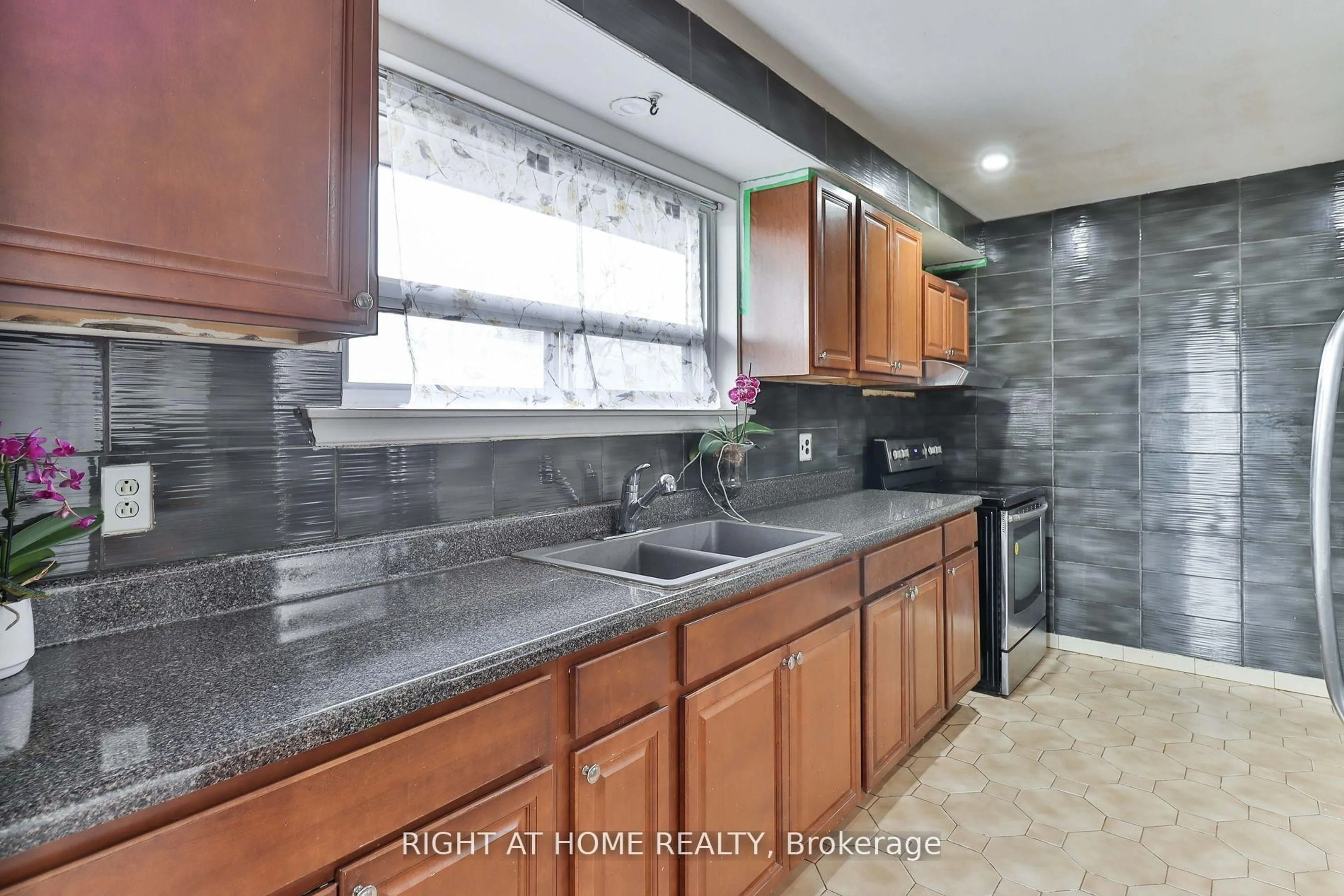 Standard kitchen, ceramic/tile floor for 14 Midden Cres, Toronto Ontario M9R 3L8