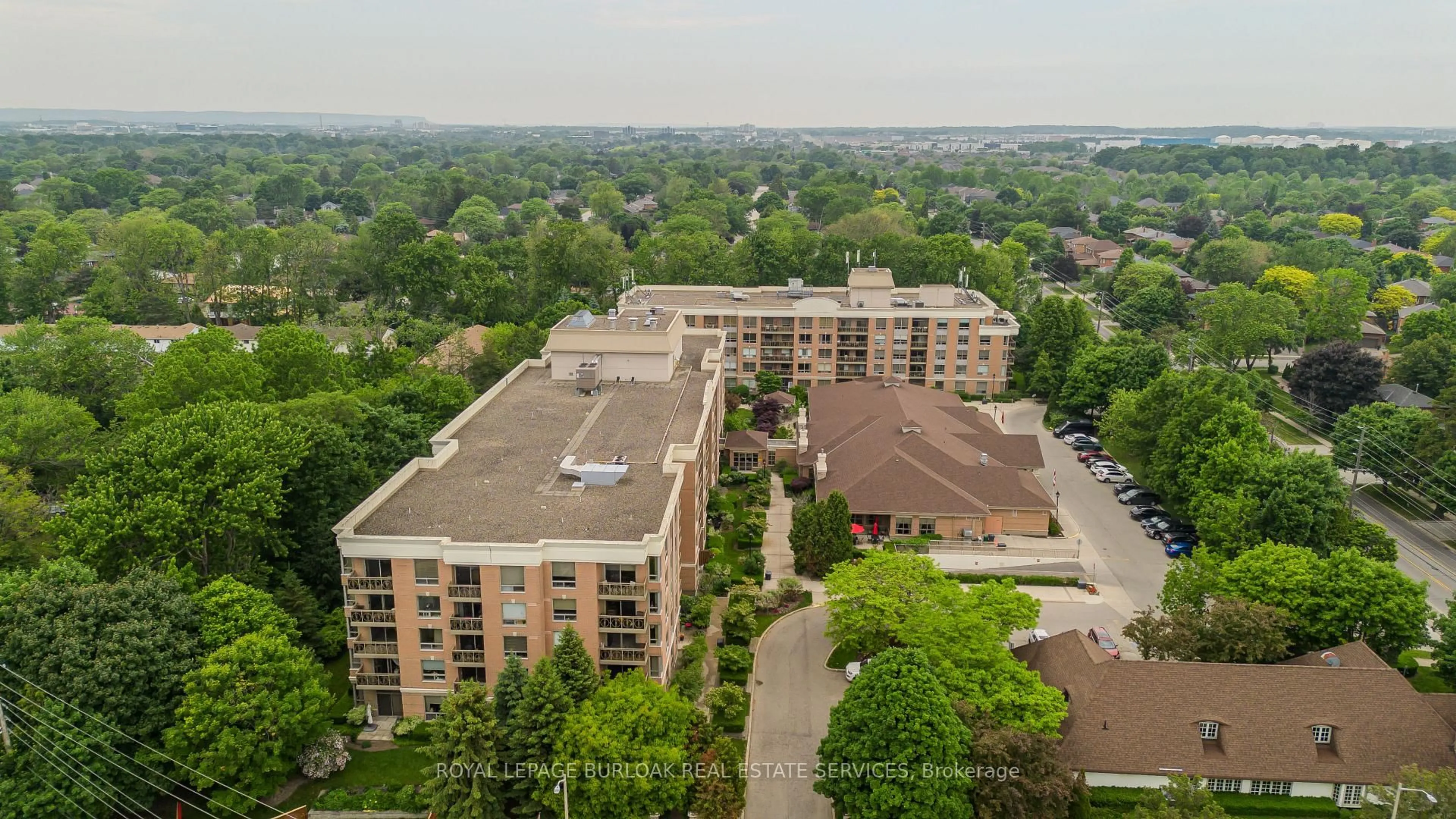 A pic from outside/outdoor area/front of a property/back of a property/a pic from drone, city buildings view from balcony for 100 Burloak Dr #2407, Burlington Ontario L7L 6P6