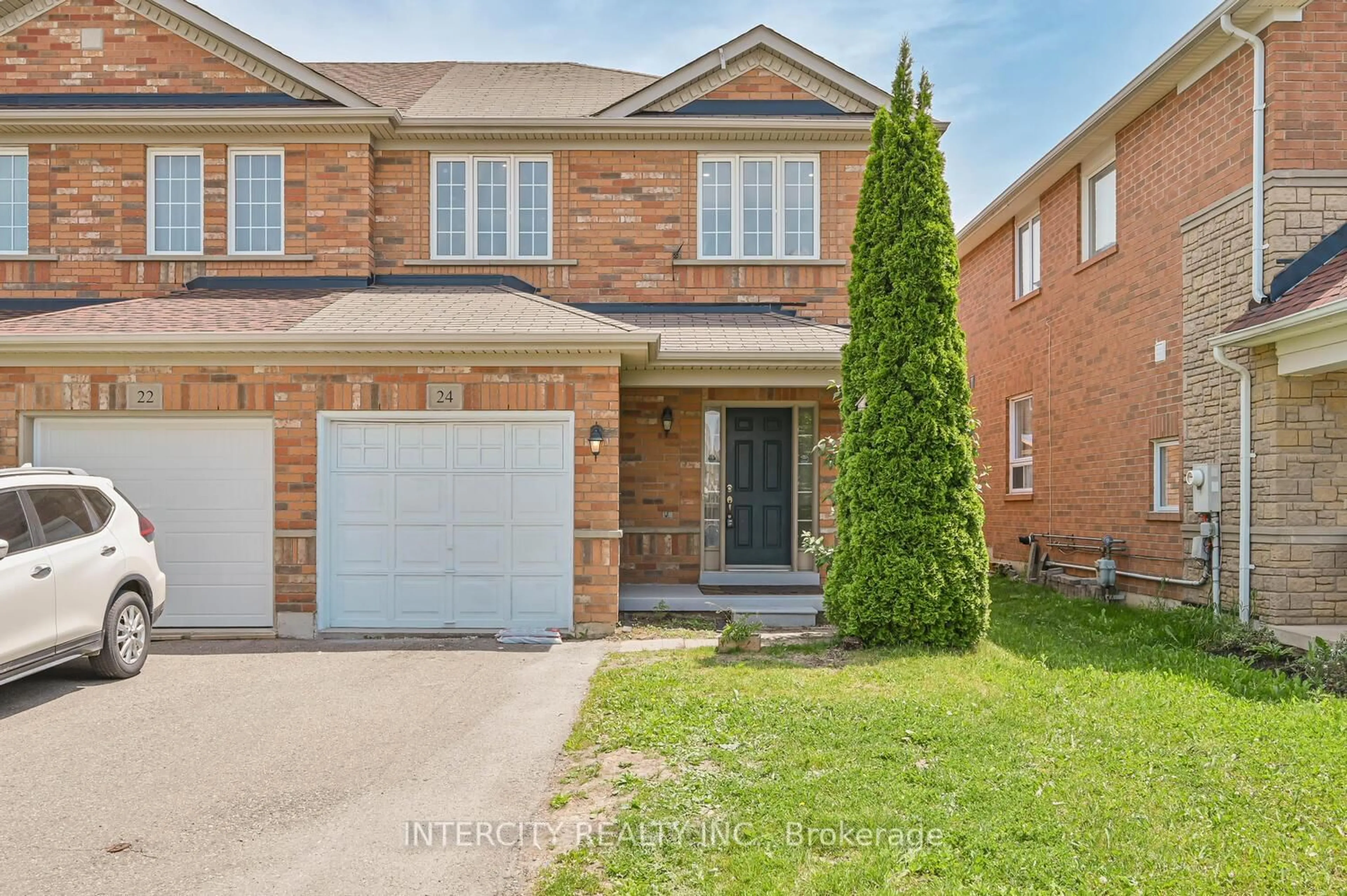 Home with brick exterior material, street for 24 Hollingsworth Circ, Brampton Ontario L7A 0J7