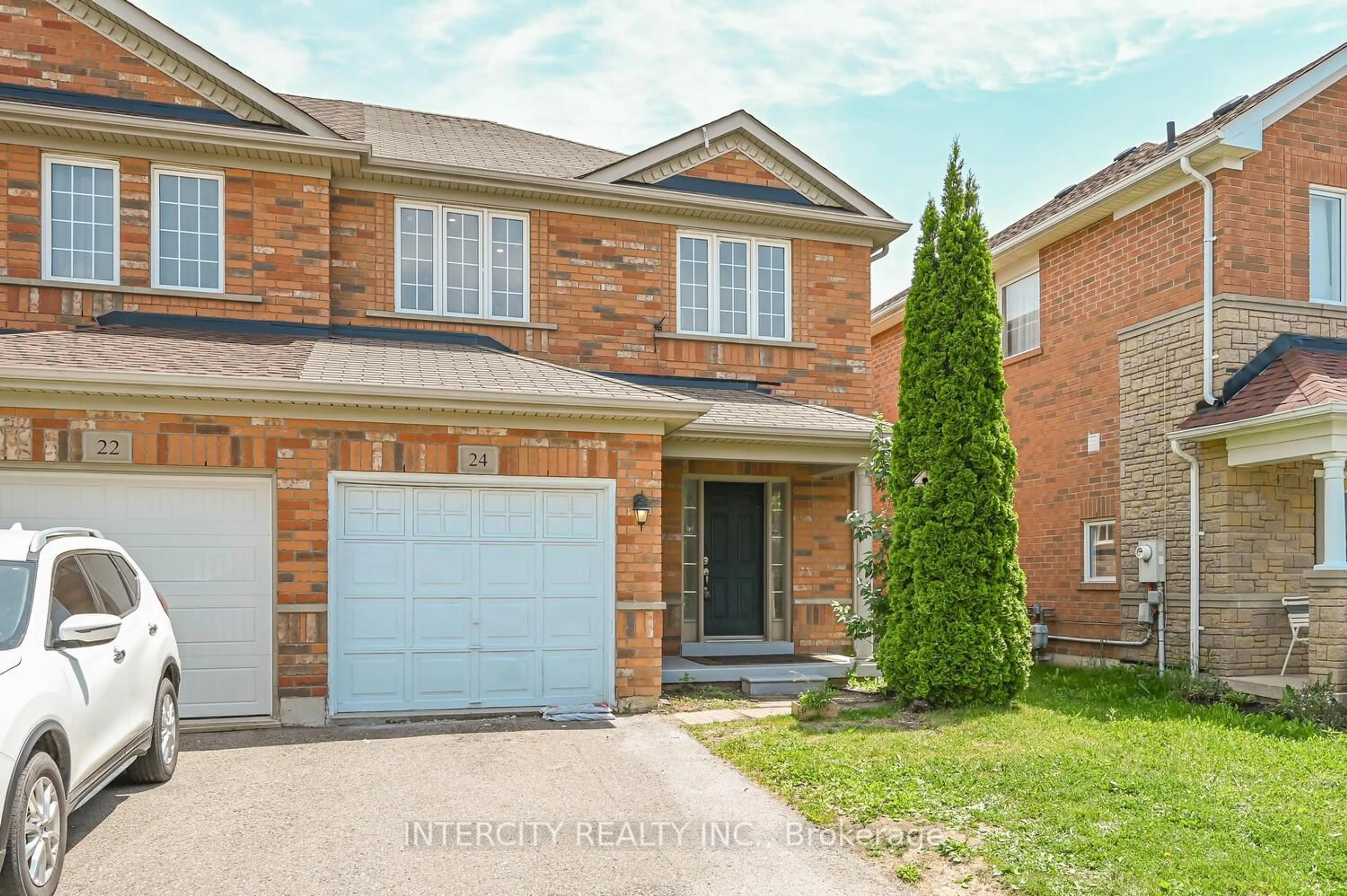 Home with brick exterior material, street for 24 Hollingsworth Circ, Brampton Ontario L7A 0J7