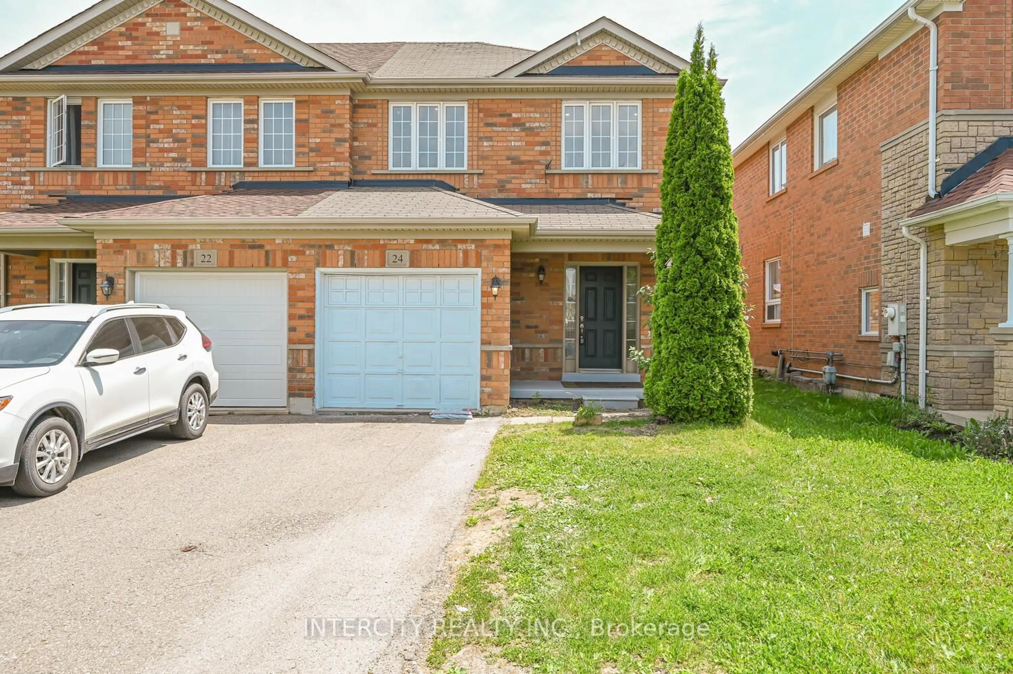 Home with brick exterior material, street for 24 Hollingsworth Circ, Brampton Ontario L7A 0J7