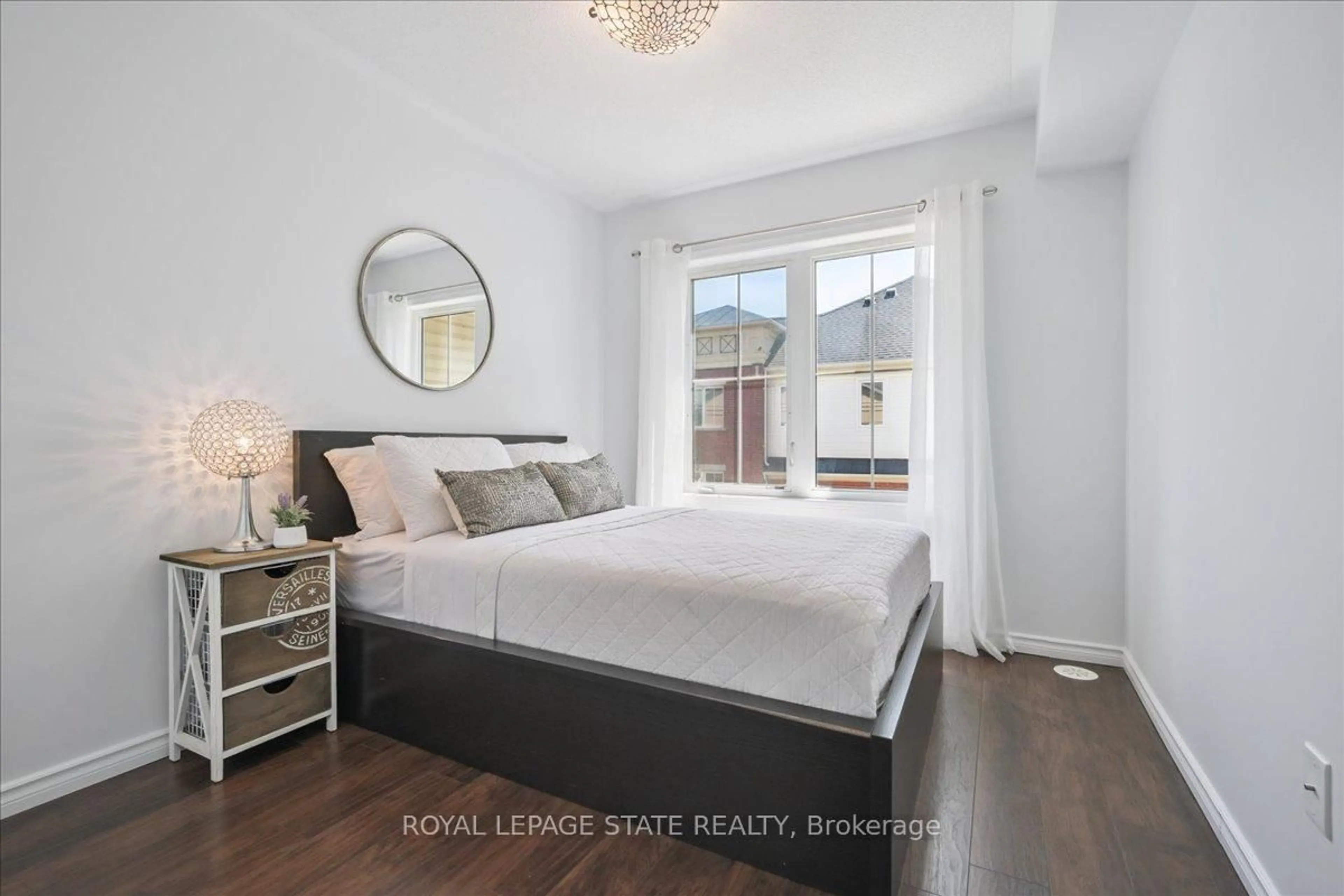Bedroom with bed, wood/laminate floor for 2450 Post Rd #21, Oakville Ontario L6H 0J2
