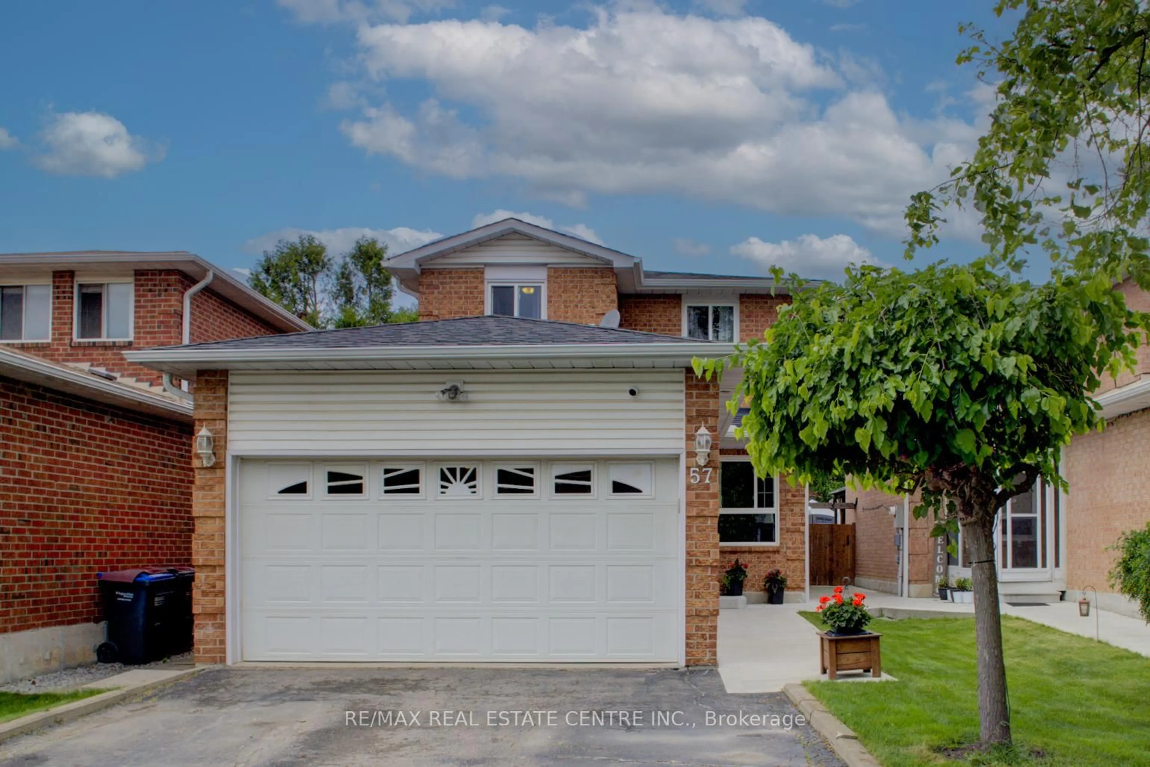 Home with brick exterior material, street for 57 Ecclestone Dr, Brampton Ontario L6X 3N2