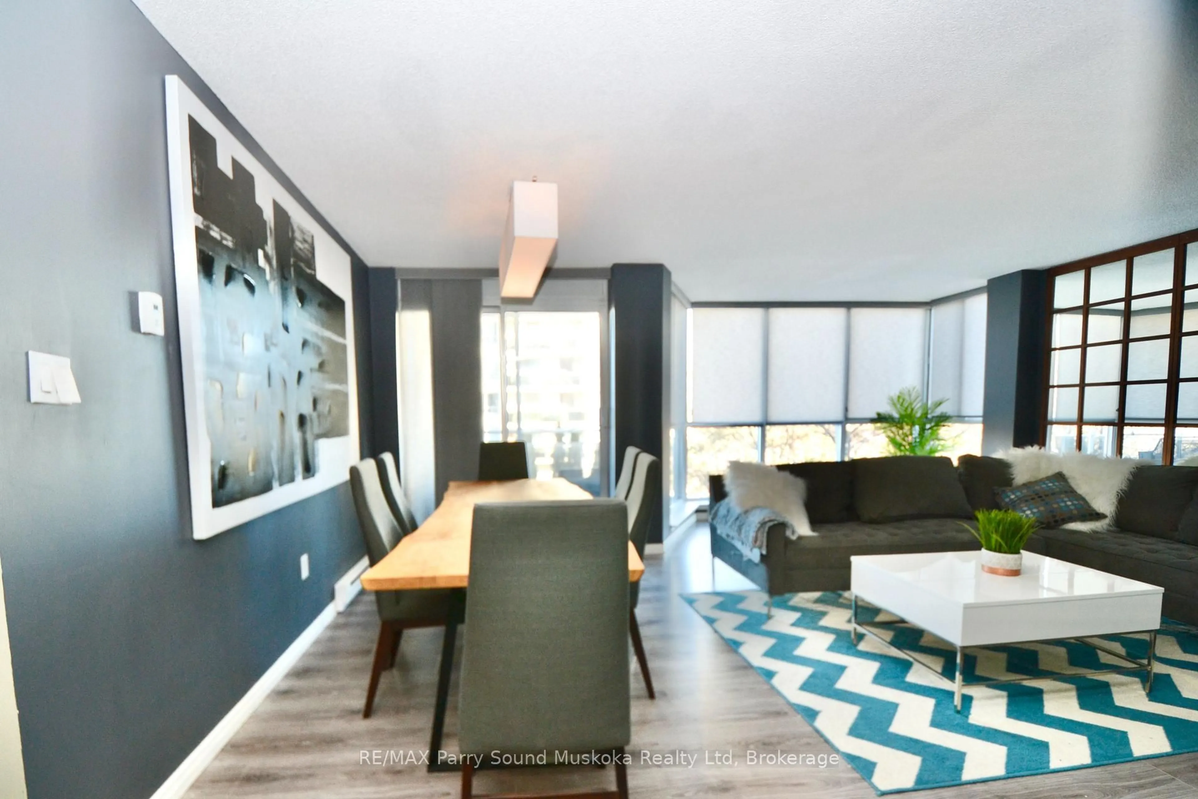 Living room with furniture, unknown for 1071 Queens Ave #205, Oakville Ontario L6H 2R5