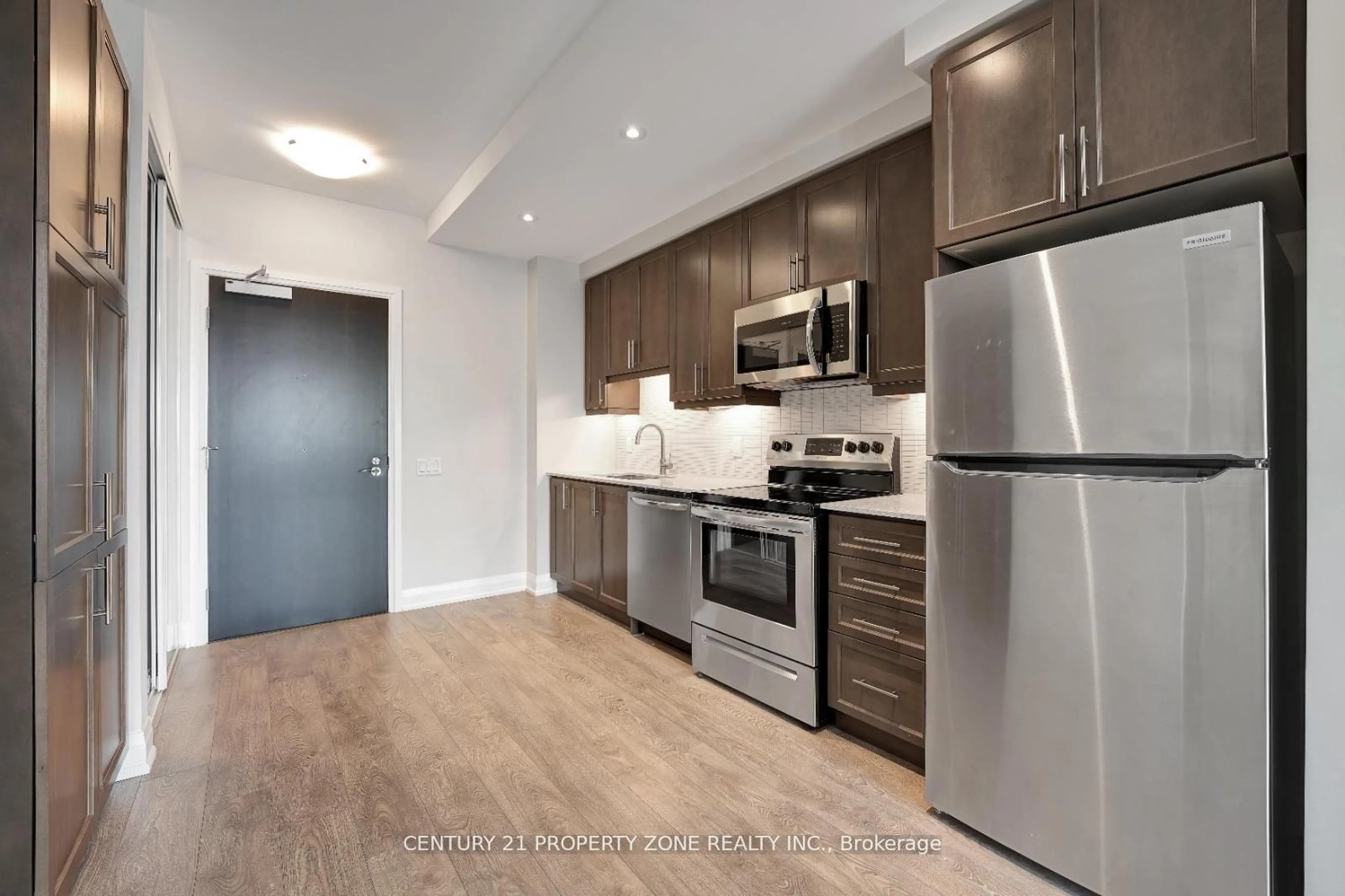 Standard kitchen, wood/laminate floor for 15 Lynch St #1207, Brampton Ontario L6W 0C7