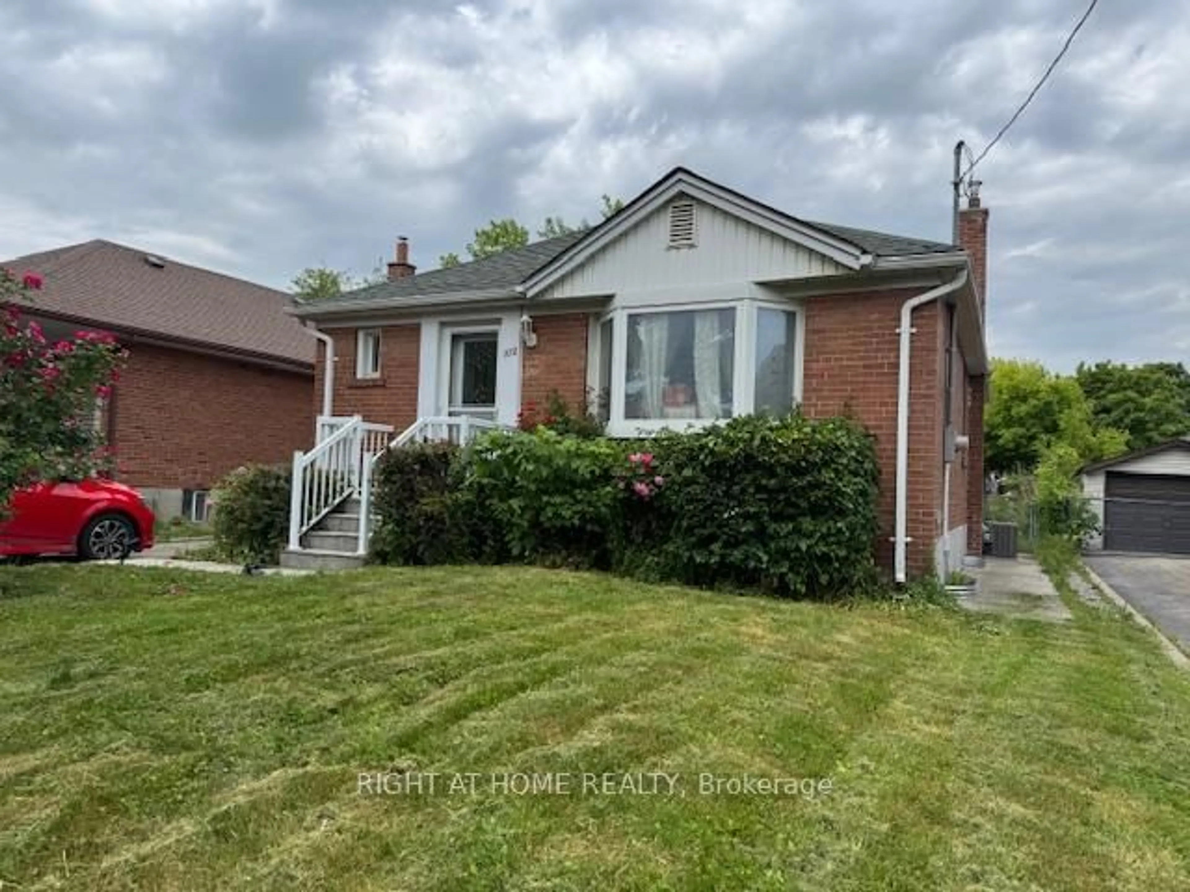 Home with brick exterior material, street for 102 Edgecroft Rd, Toronto Ontario M8Z 2C3