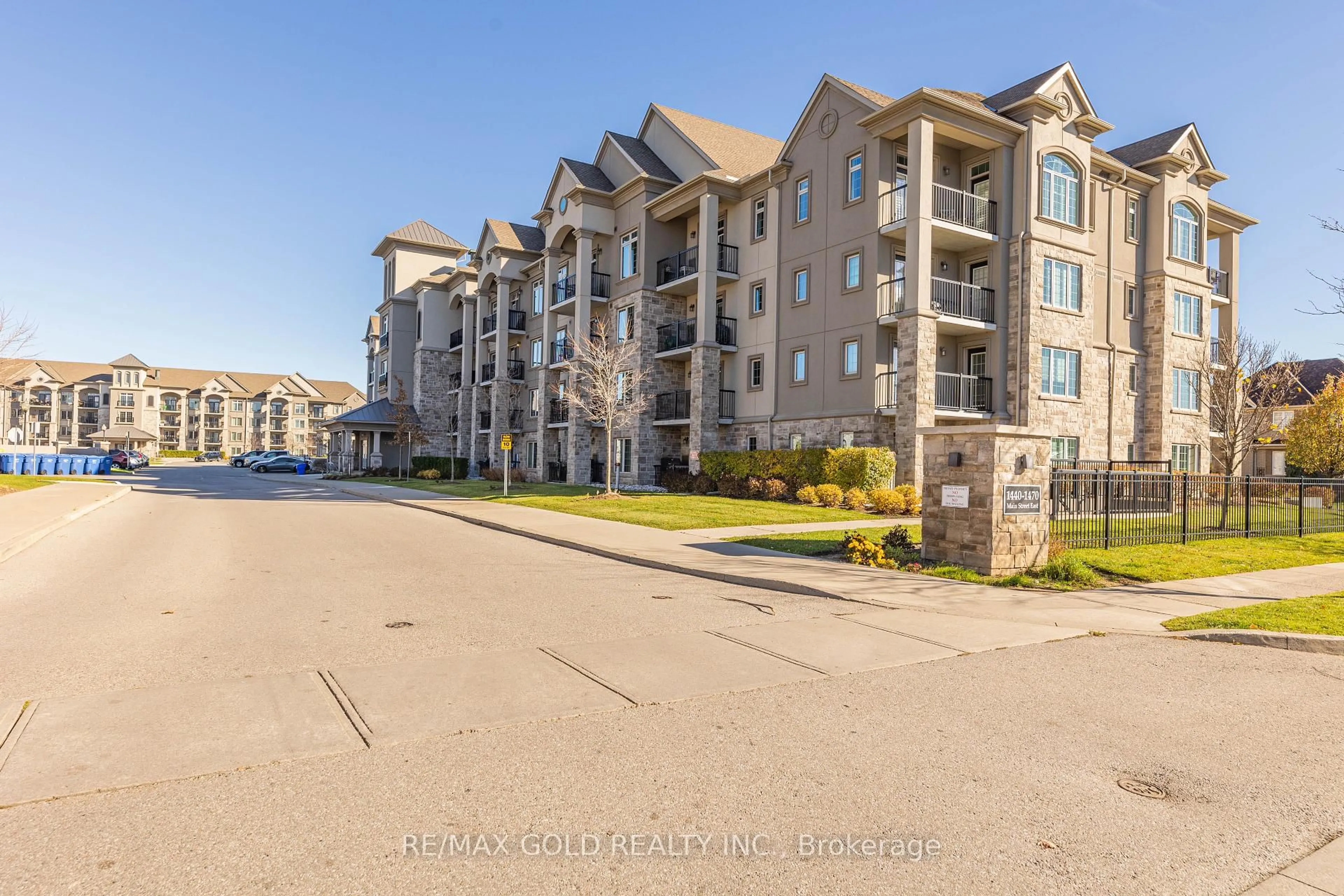 A pic from outside/outdoor area/front of a property/back of a property/a pic from drone, water/lake/river/ocean view for 1450 MAIN St #409, Milton Ontario L9T 8W4