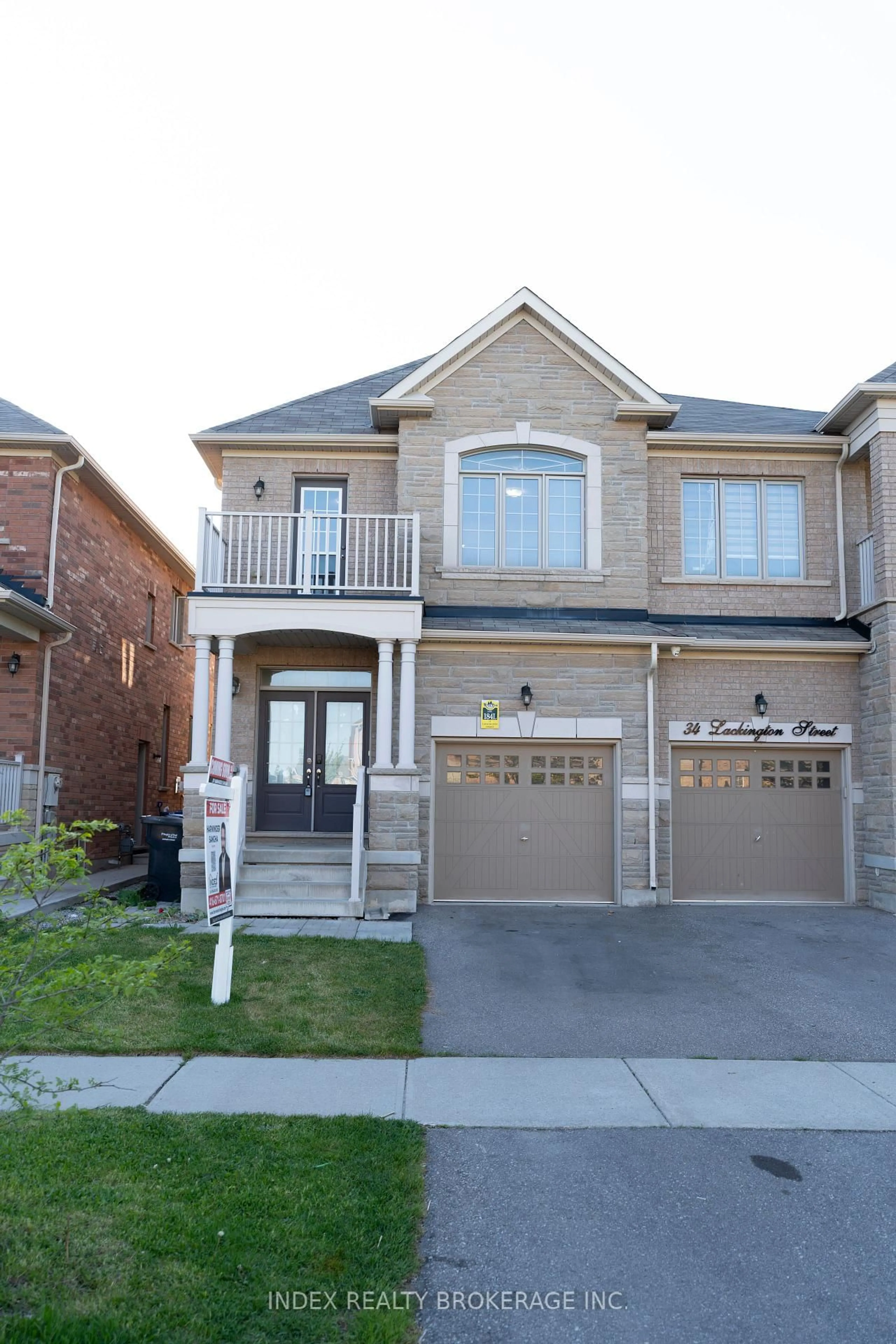 Home with brick exterior material, street for 32 Lackington St, Brampton Ontario L6X 5P1