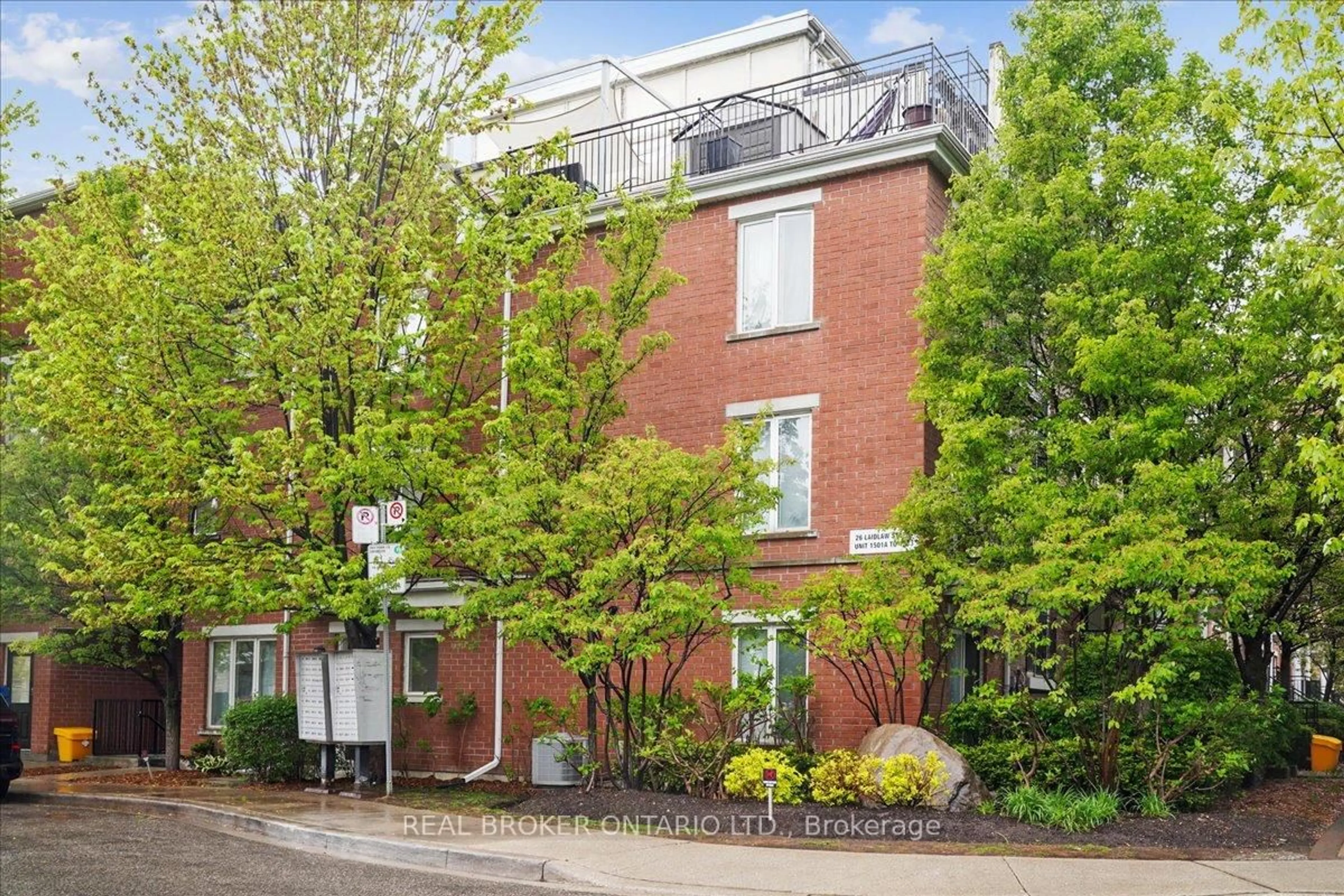 Home with brick exterior material, street for 22 Laidlaw St #1233C, Toronto Ontario M6K 1X2