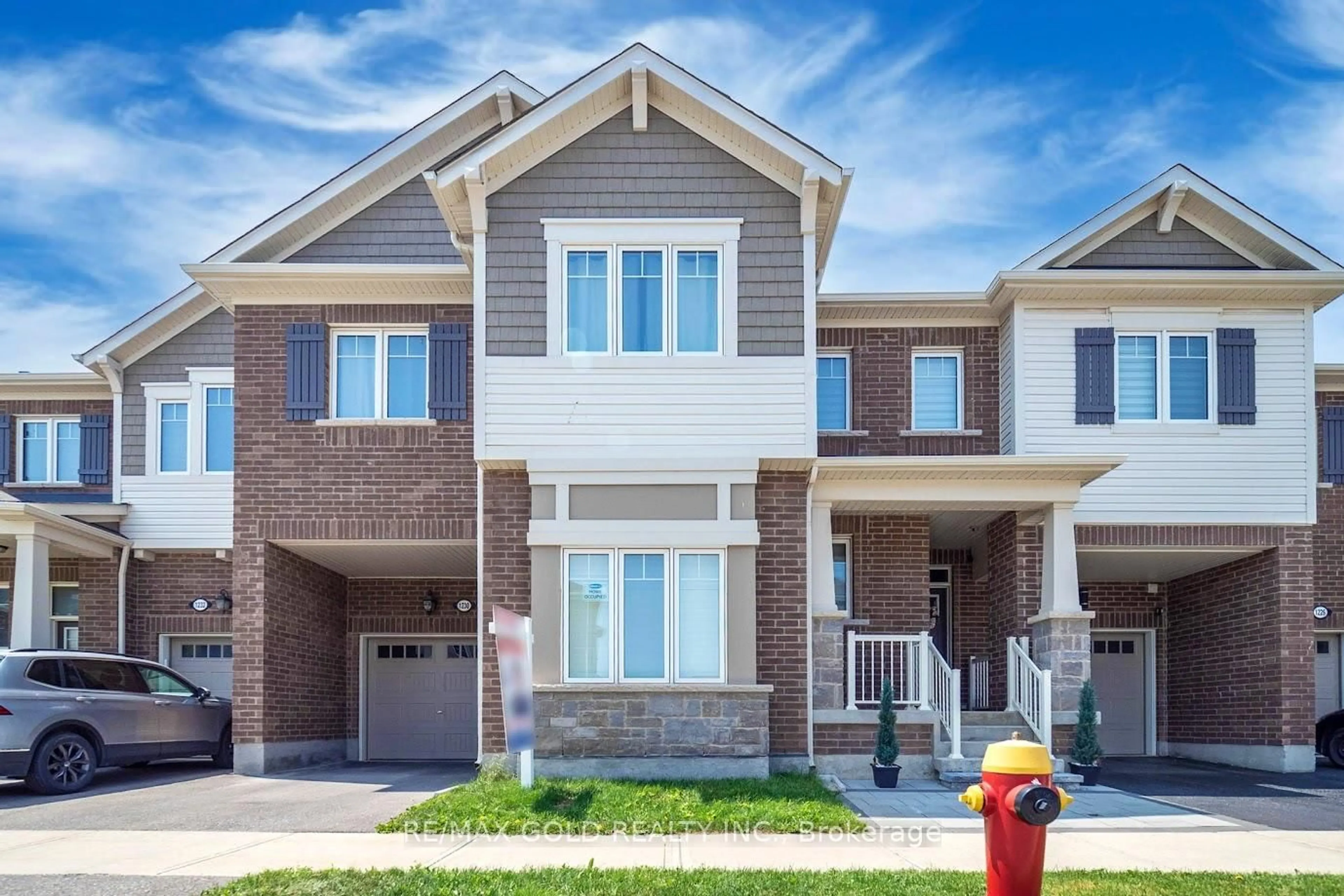 Home with brick exterior material, street for 1230 Hazel Way, Milton Ontario L9E 1S1