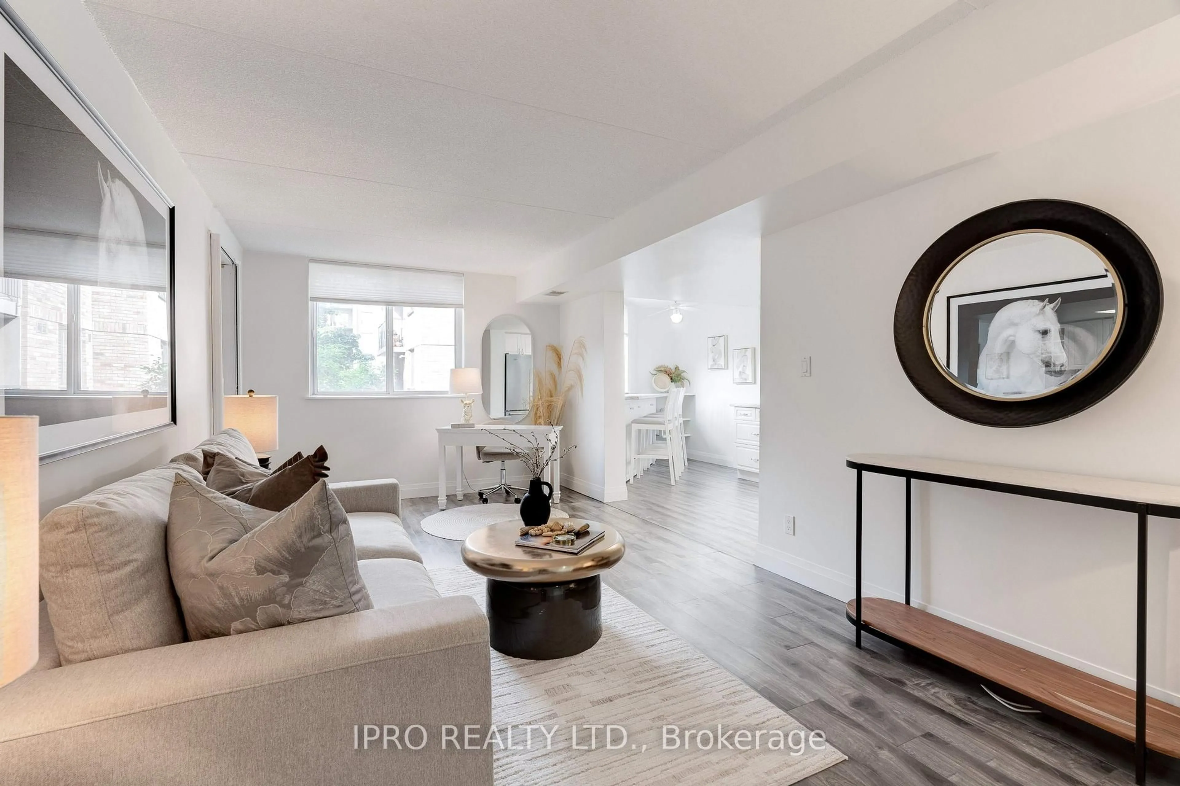 Living room with furniture, unknown for 3499 Upper Middle Rd #211, Burlington Ontario L7M 4M7