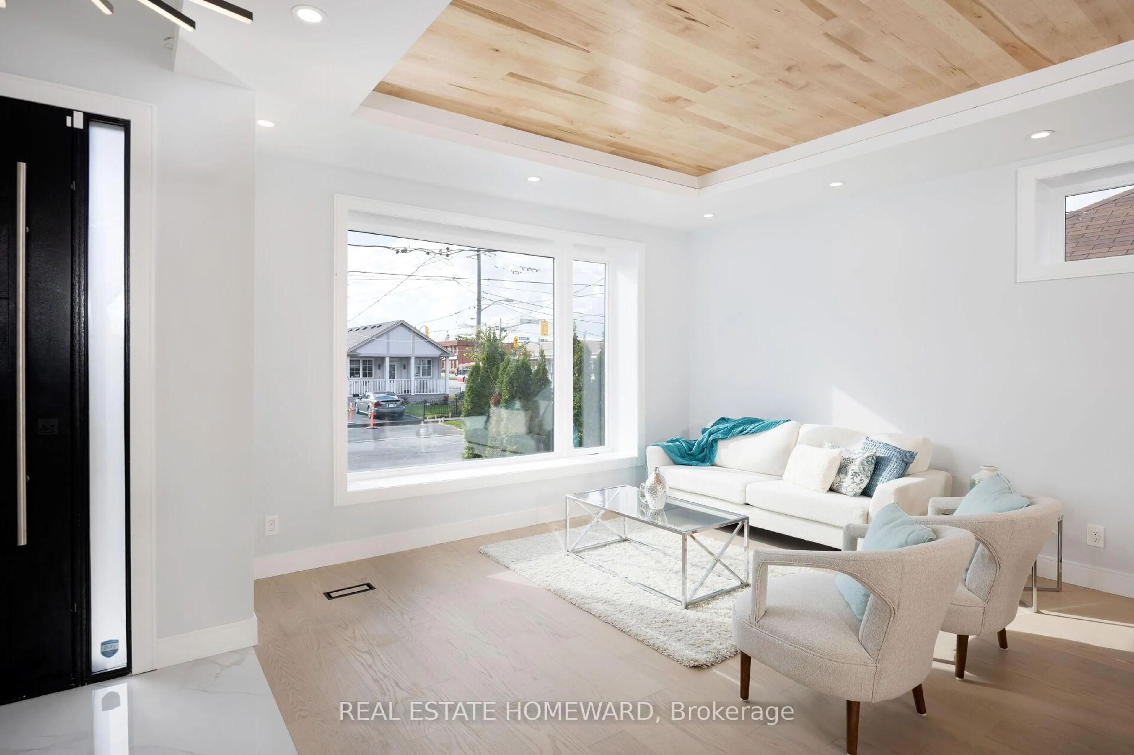 Living room with furniture, wood/laminate floor for 307 Delta St, Toronto Ontario M8W 4G1