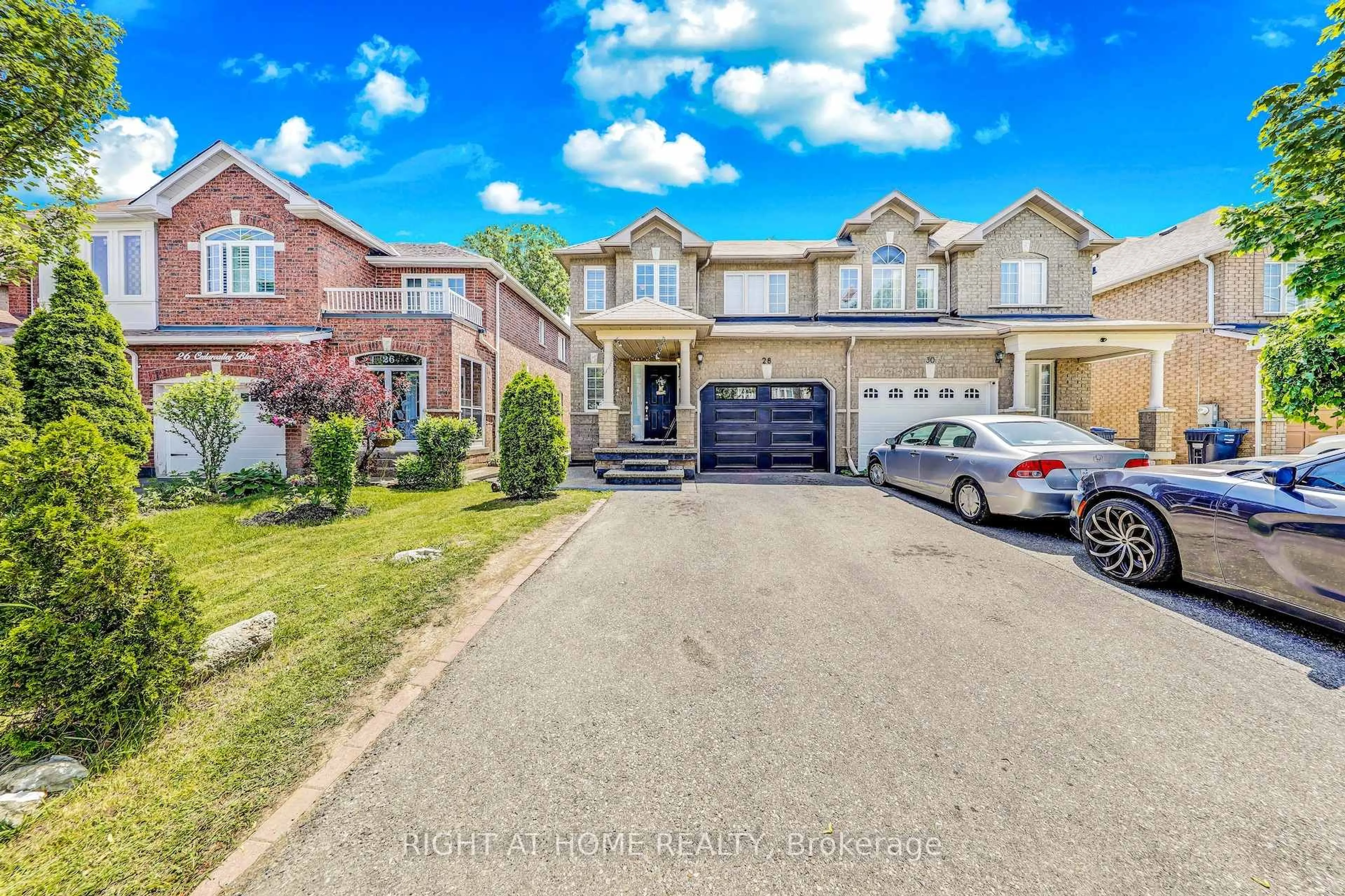 Home with brick exterior material, street for 28 Cedarvalley Blvd, Brampton Ontario L7A 2C2