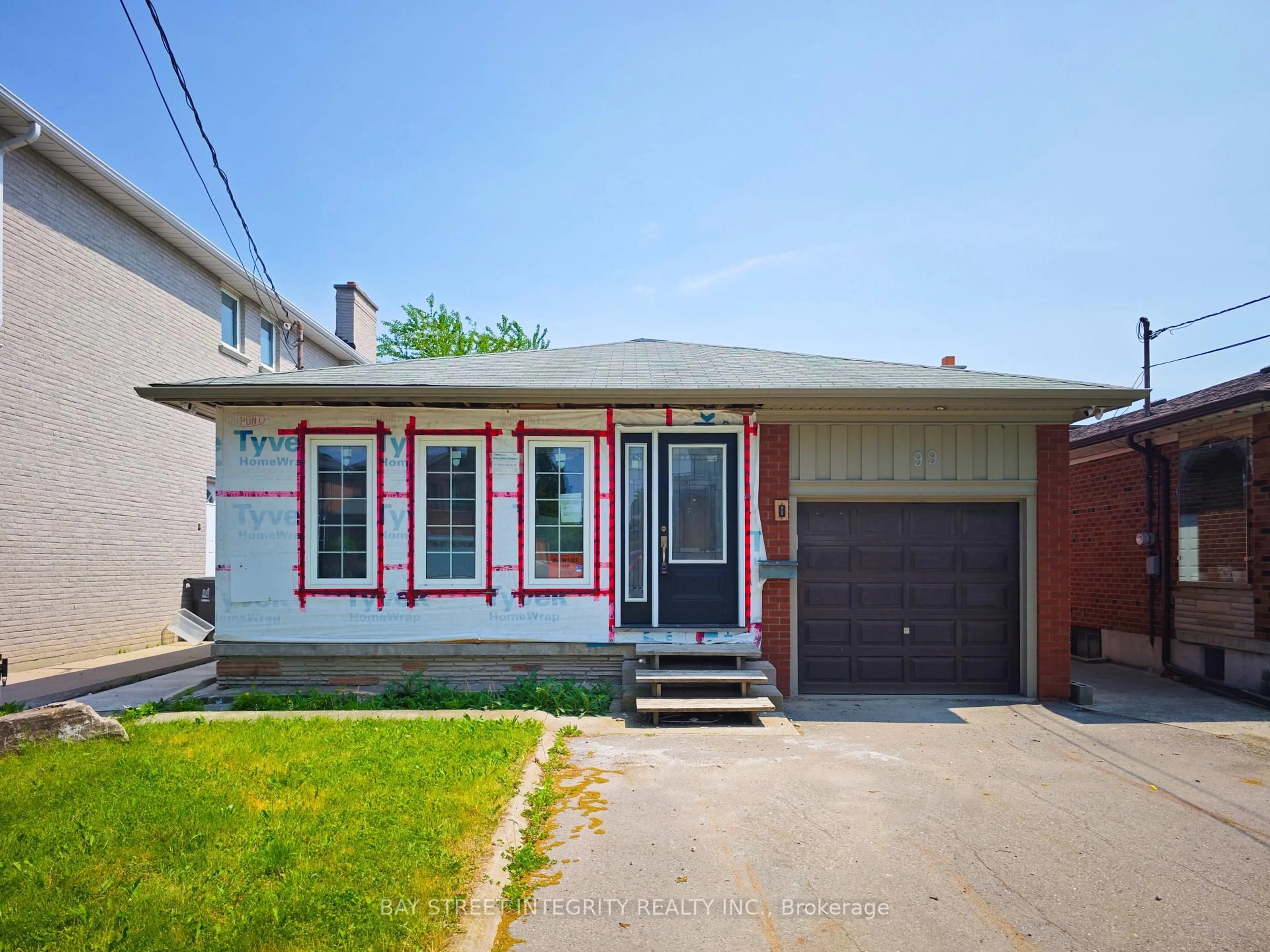 Home with vinyl exterior material, street for 99 Regent Rd, Toronto Ontario M3K 1H2
