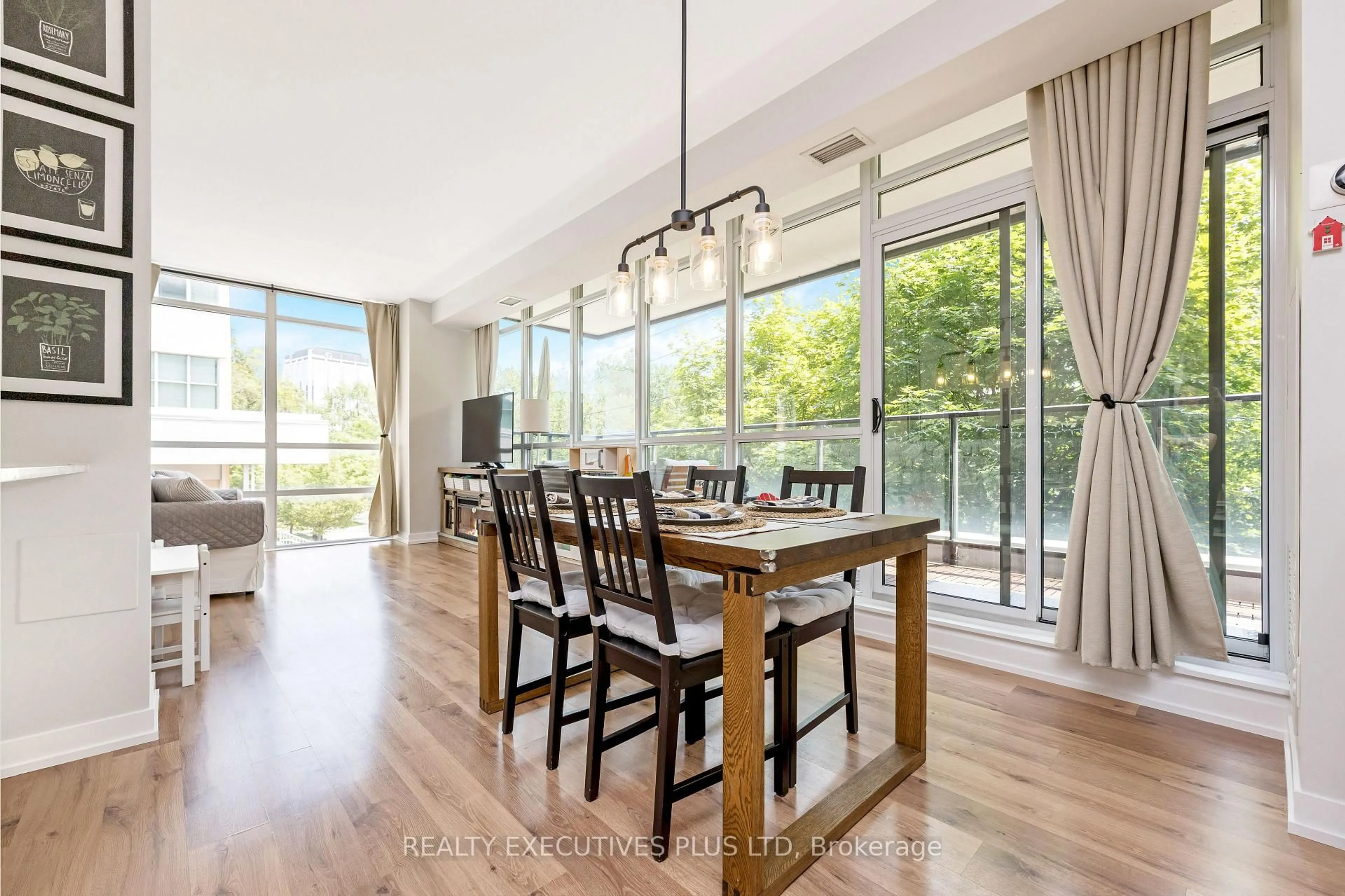 Dining room, wood/laminate floor for 8 Fieldway Rd #210, Toronto Ontario M8Z 0C3