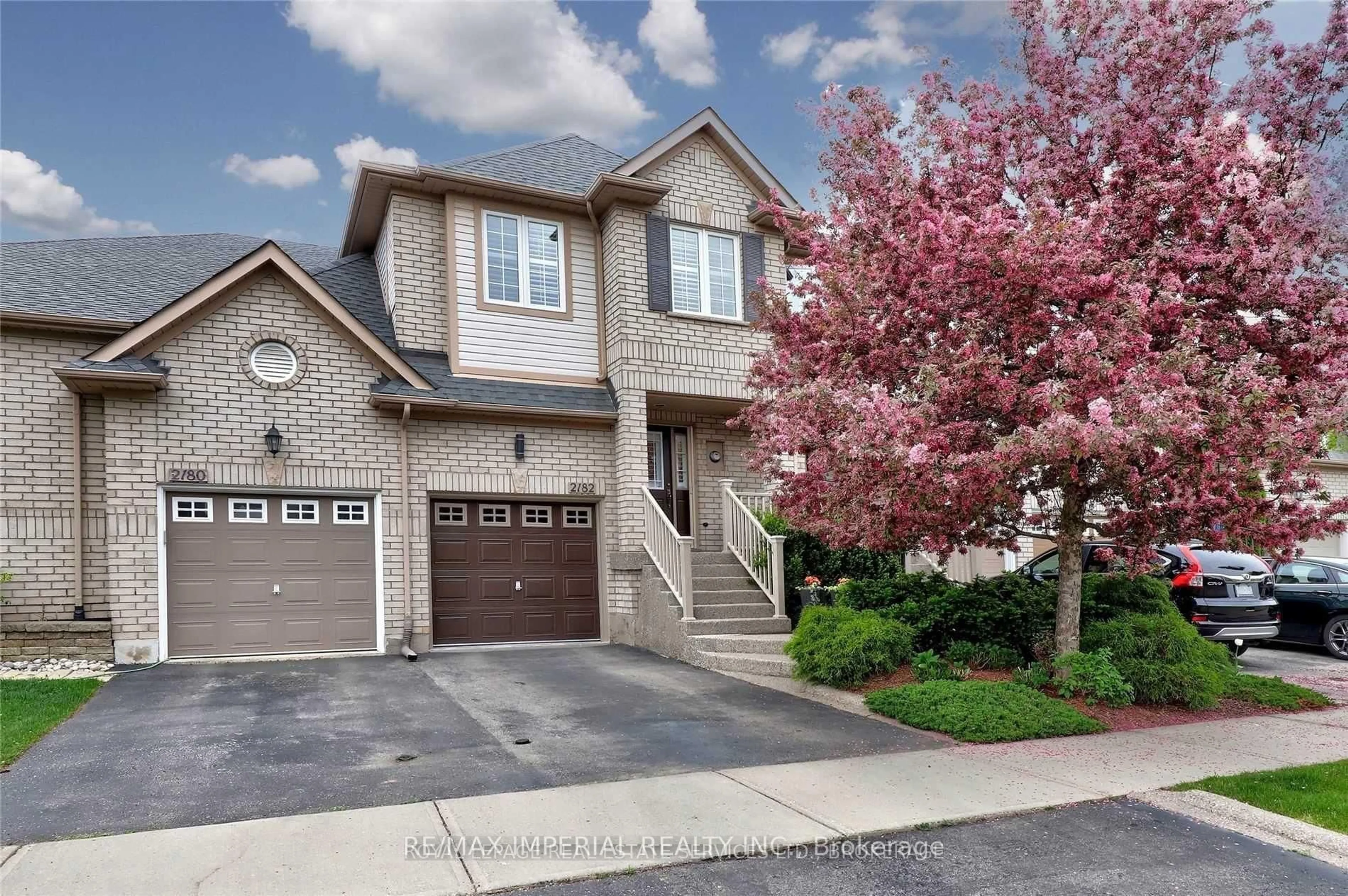 Home with brick exterior material, street for 2182 Oakpoint Rd, Oakville Ontario L6M 3N4
