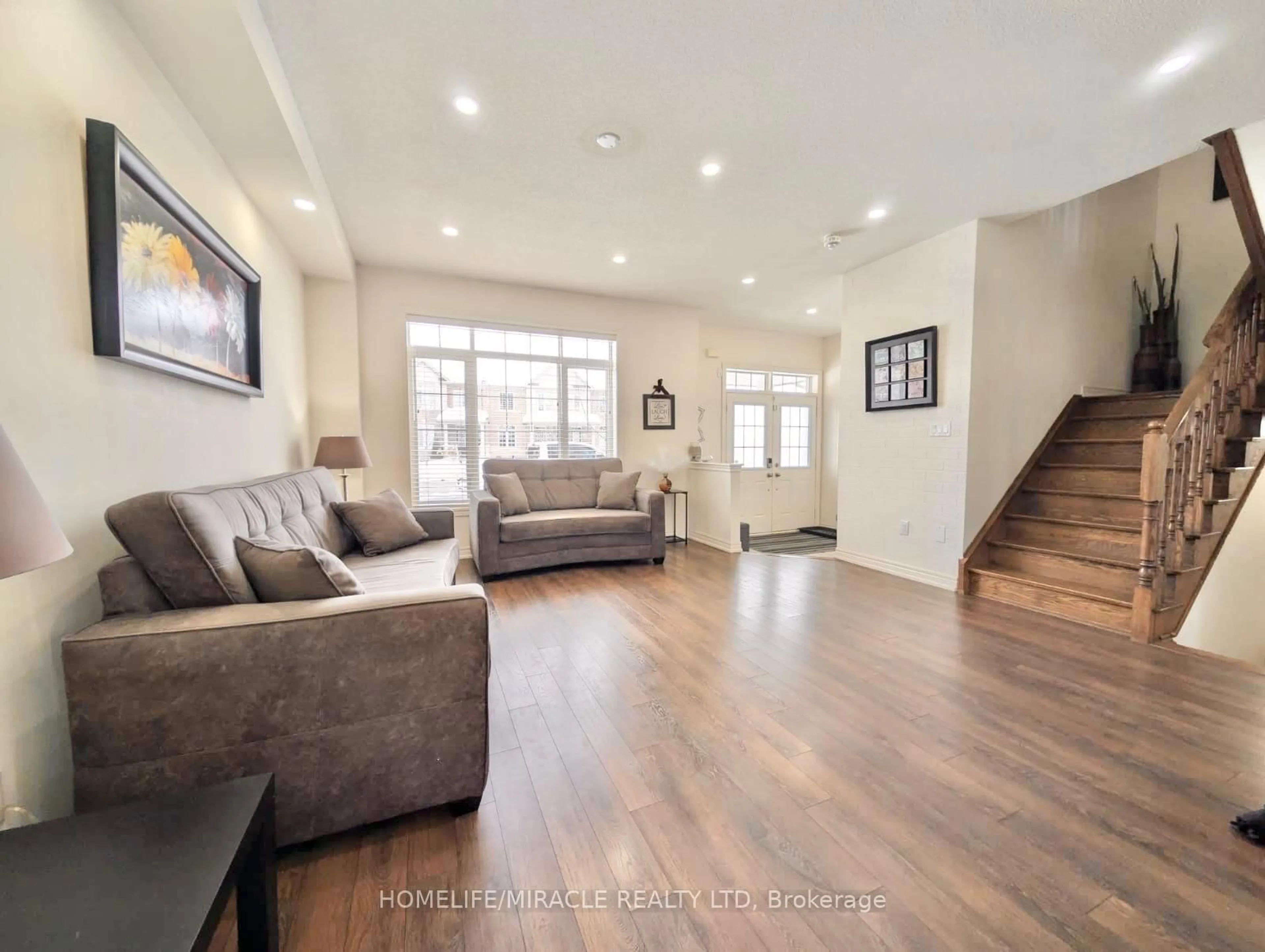 Living room with furniture, unknown for 149 Remembrance Rd, Brampton Ontario L7A 3Y2