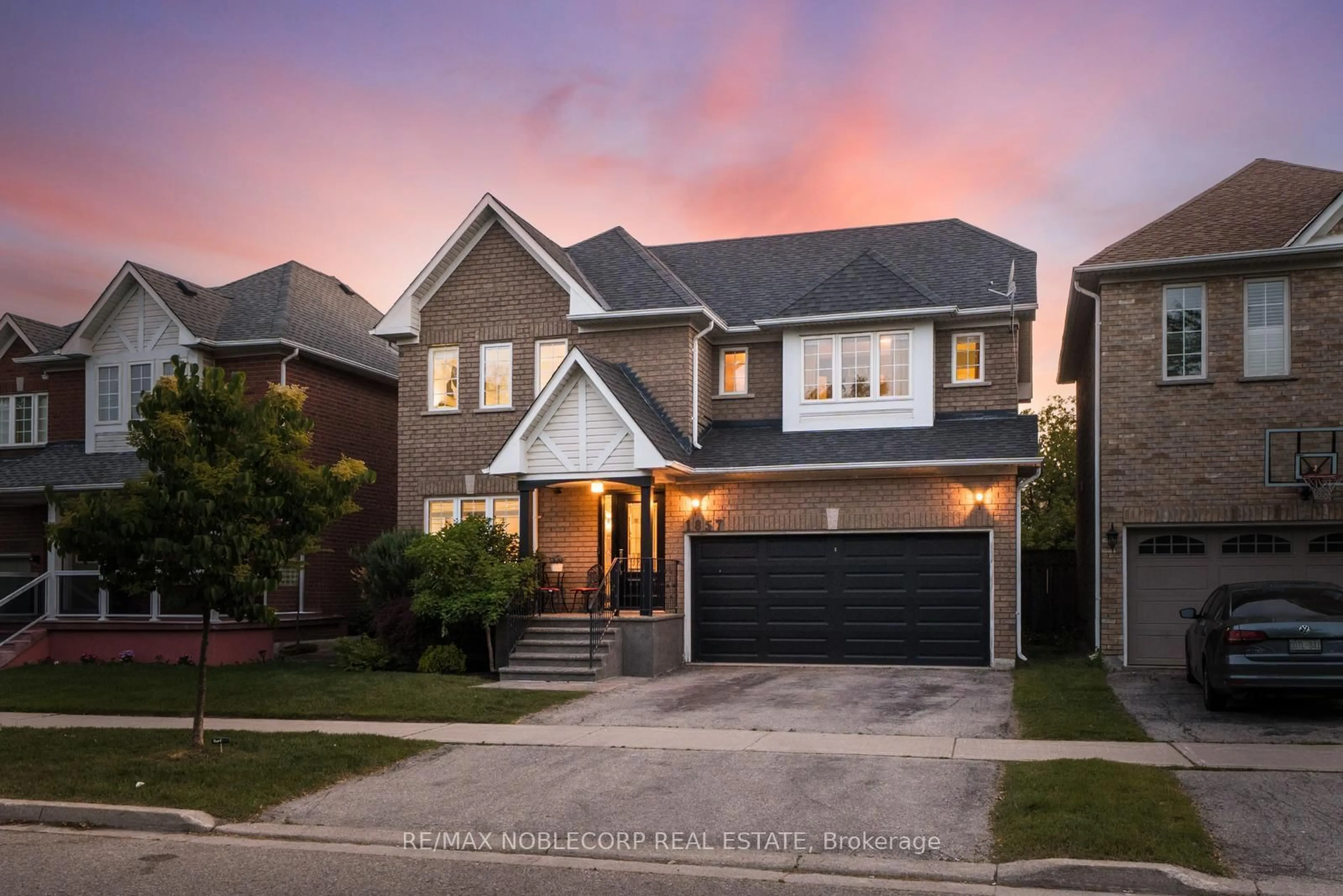 Home with brick exterior material, street for 1857 Samuelson Circ, Mississauga Ontario L5N 7Z2