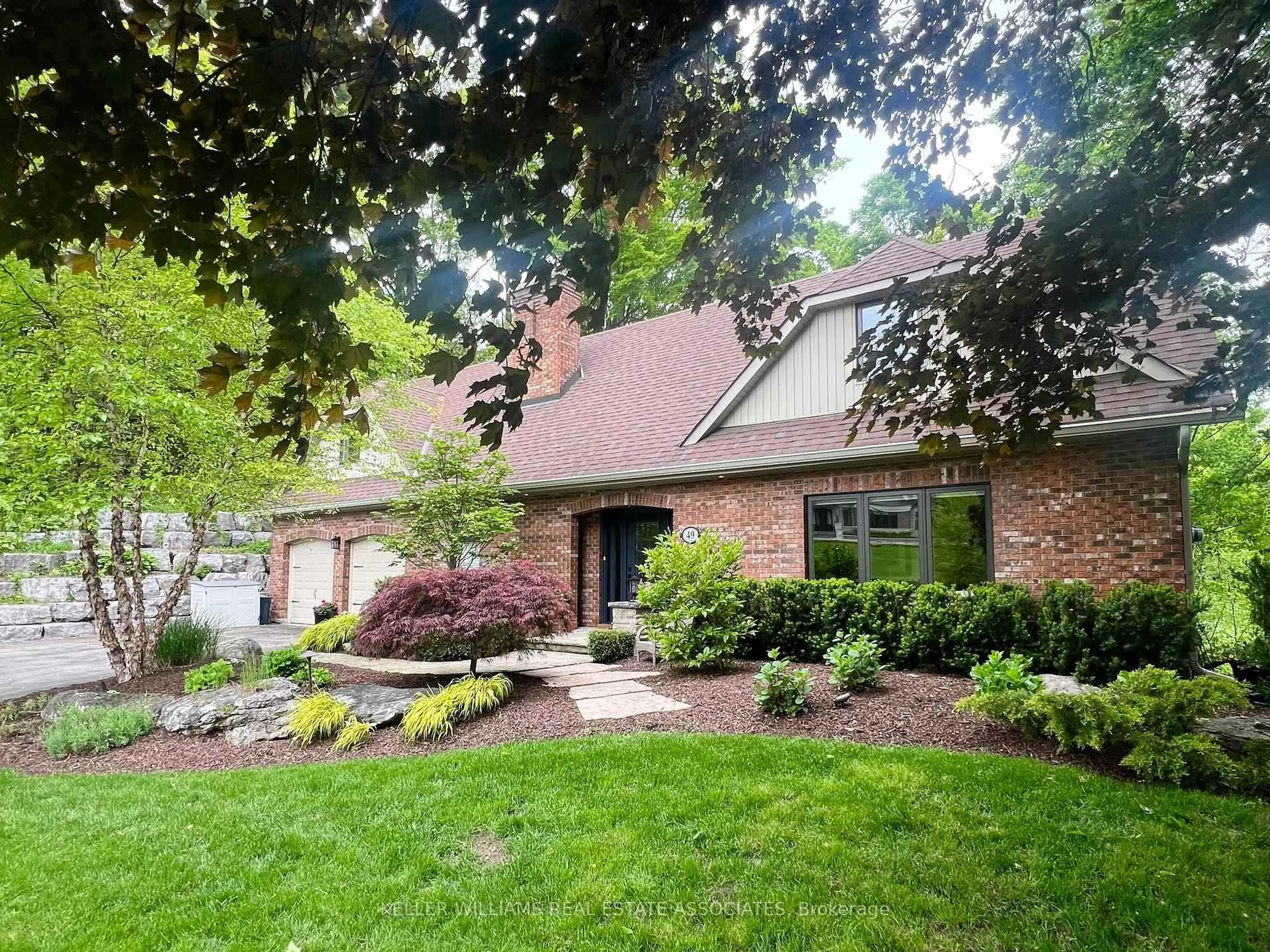 Home with brick exterior material, street for 49 Wildwood Rd, Halton Hills Ontario L7G 2W8