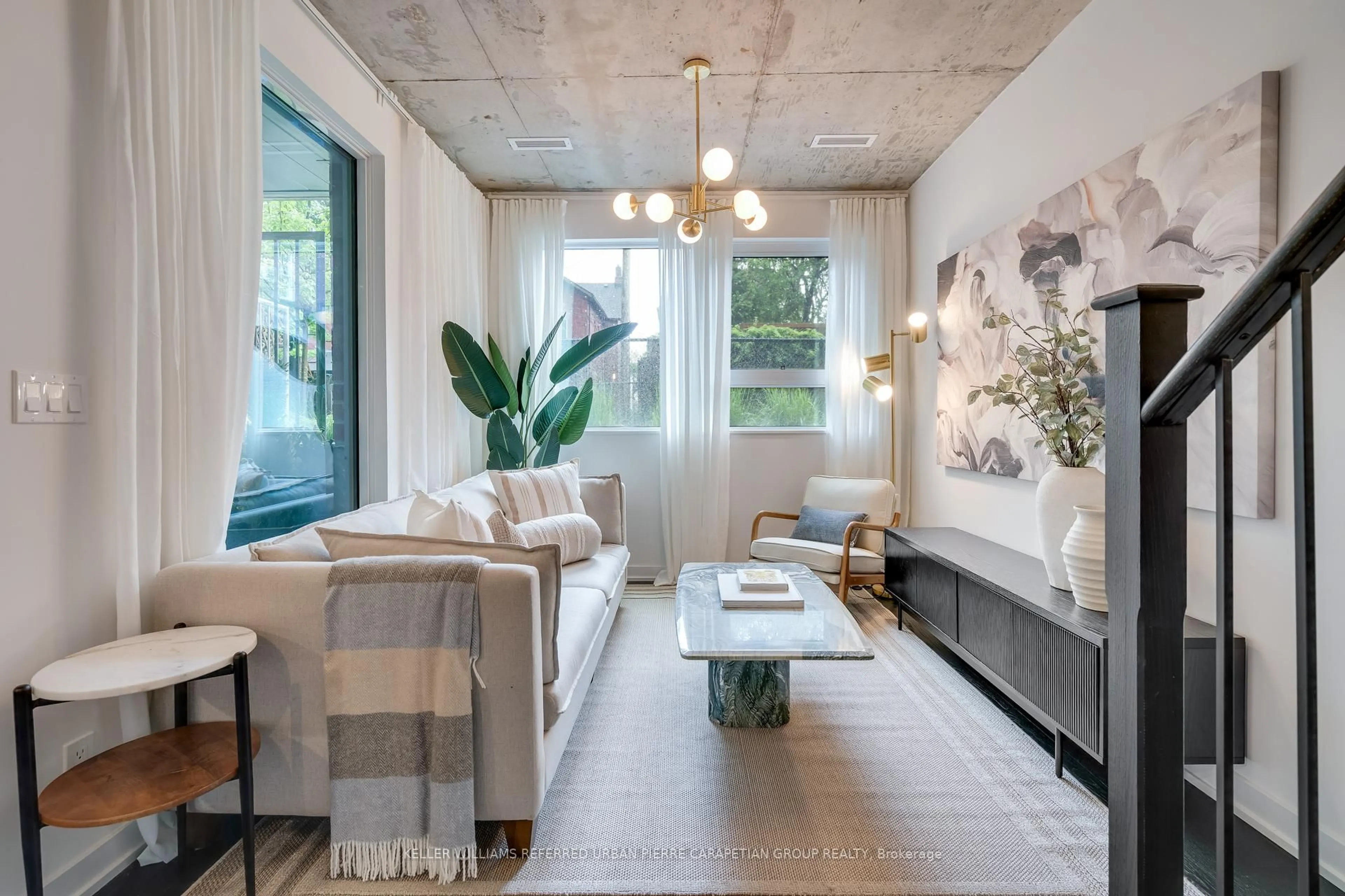 Living room with furniture, unknown for 57 Brock Ave #TH 109, Toronto Ontario M6K 0H3