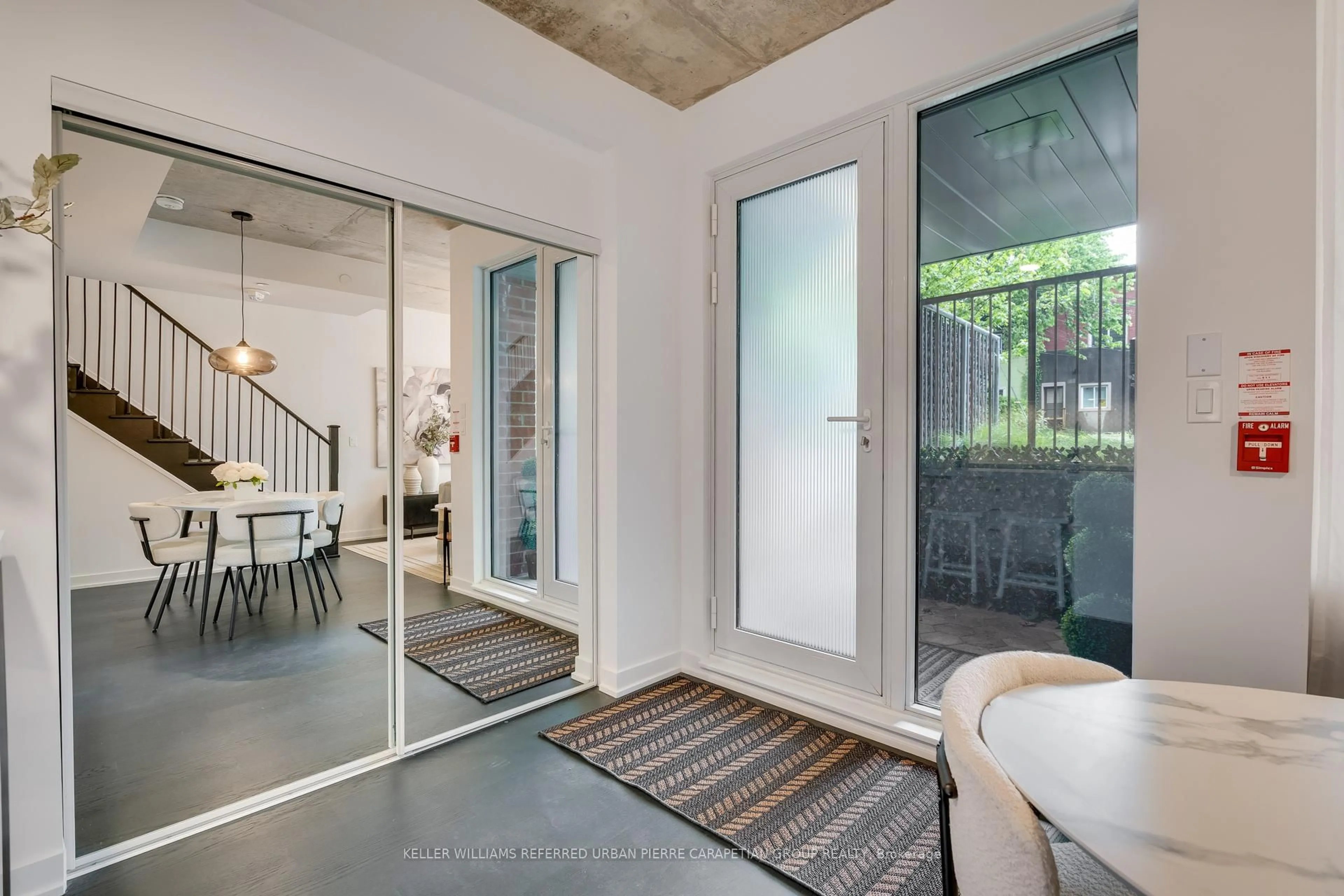 Indoor entryway for 57 Brock Ave #TH 109, Toronto Ontario M6K 0H3