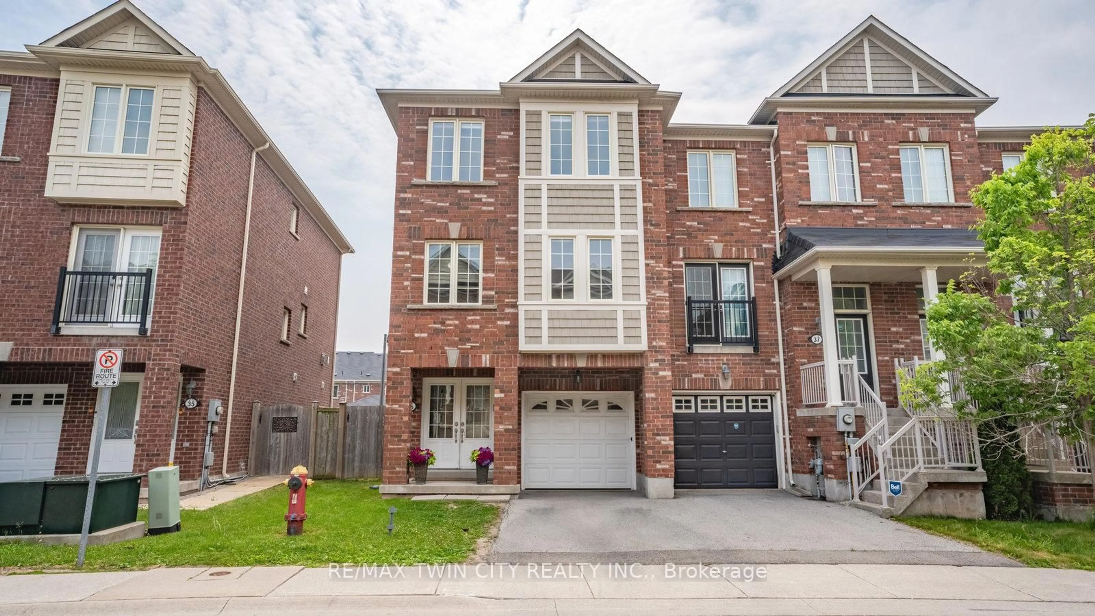 Home with brick exterior material, street for 2186 Fiddlers Way #36, Oakville Ontario L6M 0L5