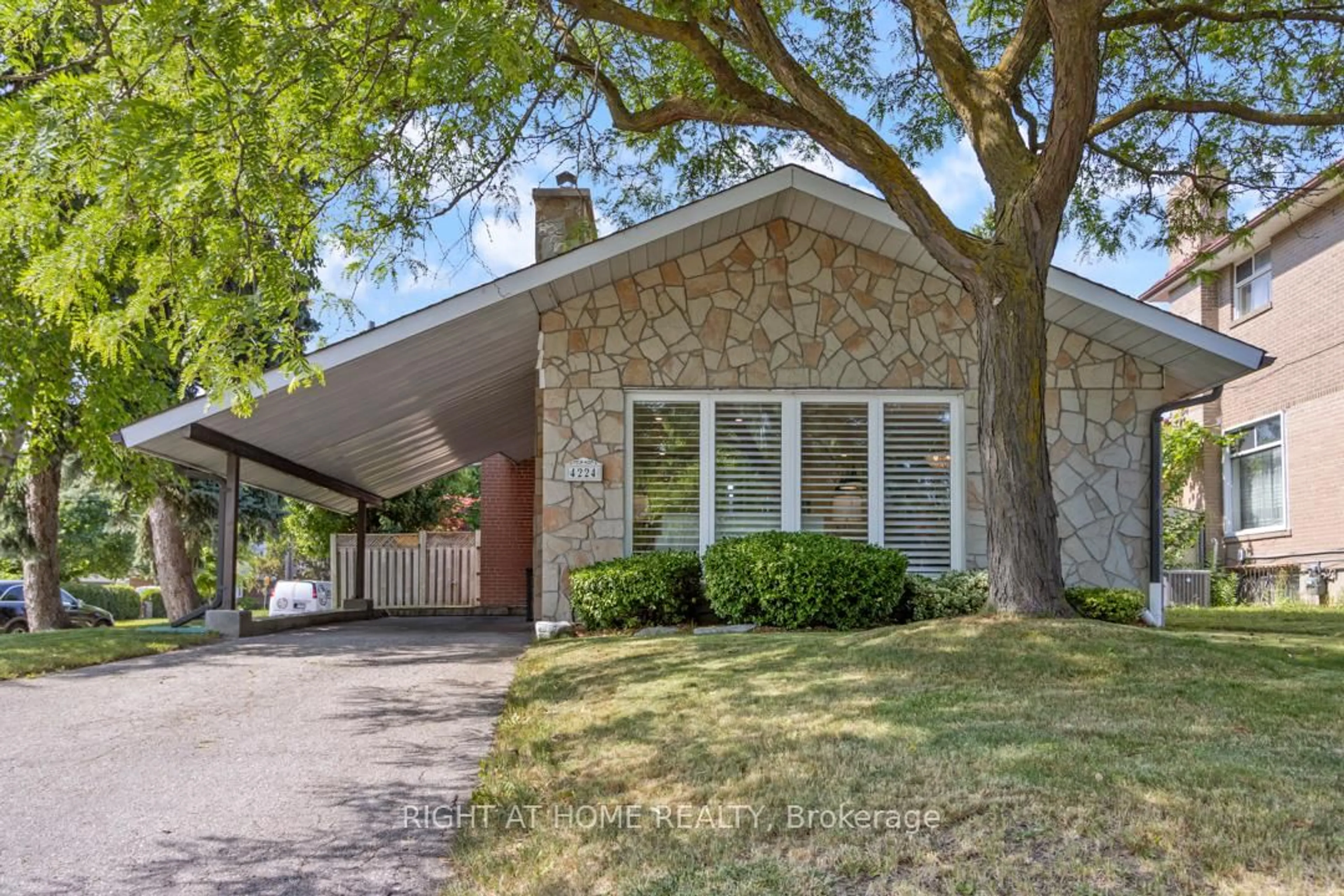 Home with brick exterior material, street for 4224 Bloor St, Toronto Ontario M9C 1Z5
