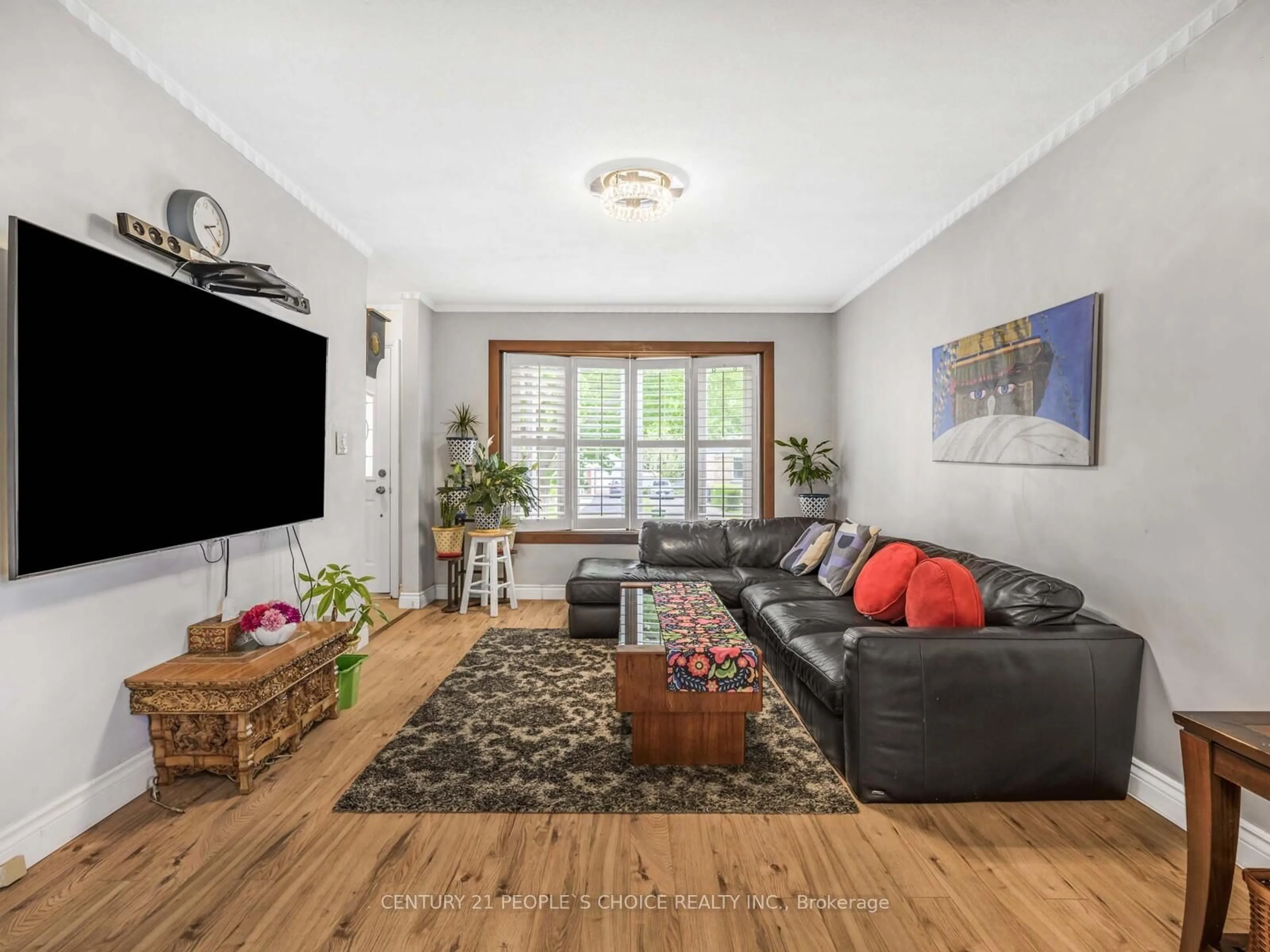 Living room with furniture, wood/laminate floor for 22 Chartwell Rd, Toronto Ontario M8Z 4E8