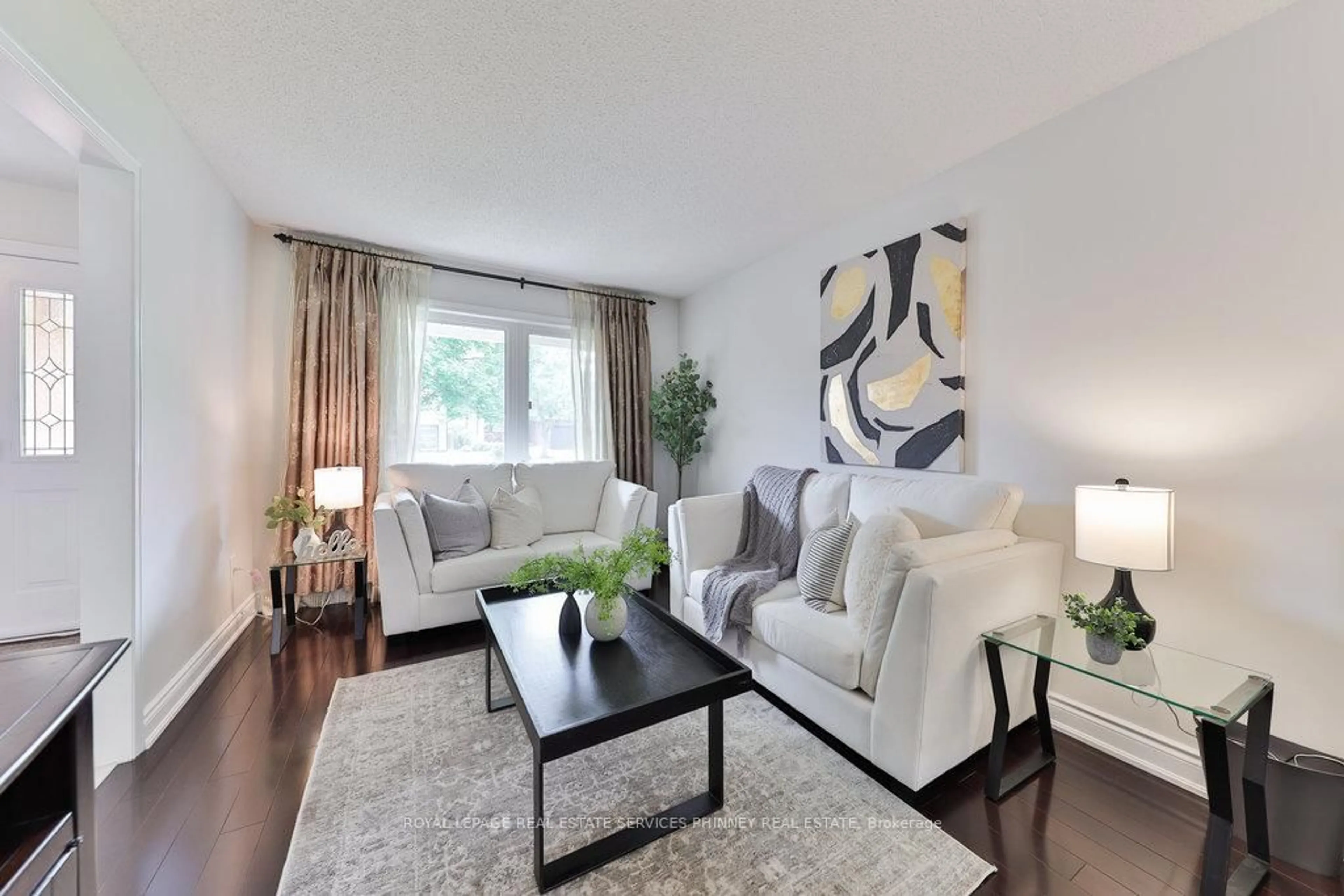 Living room with furniture, wood/laminate floor for 296 Evergreen Cres, Oakville Ontario L6H 4P5
