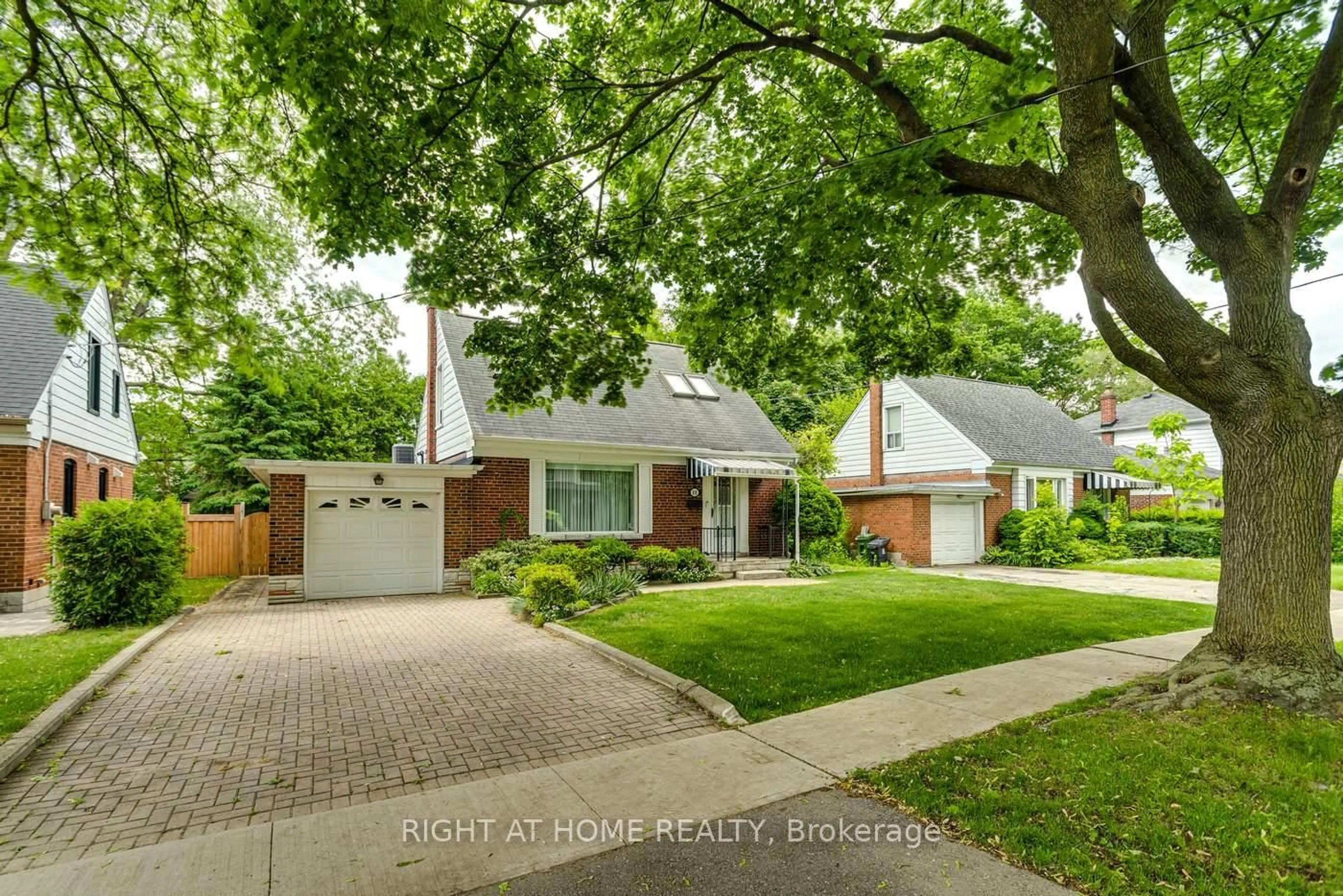 Home with brick exterior material, street for 11 Ambleside Ave, Toronto Ontario M8Z 2H5