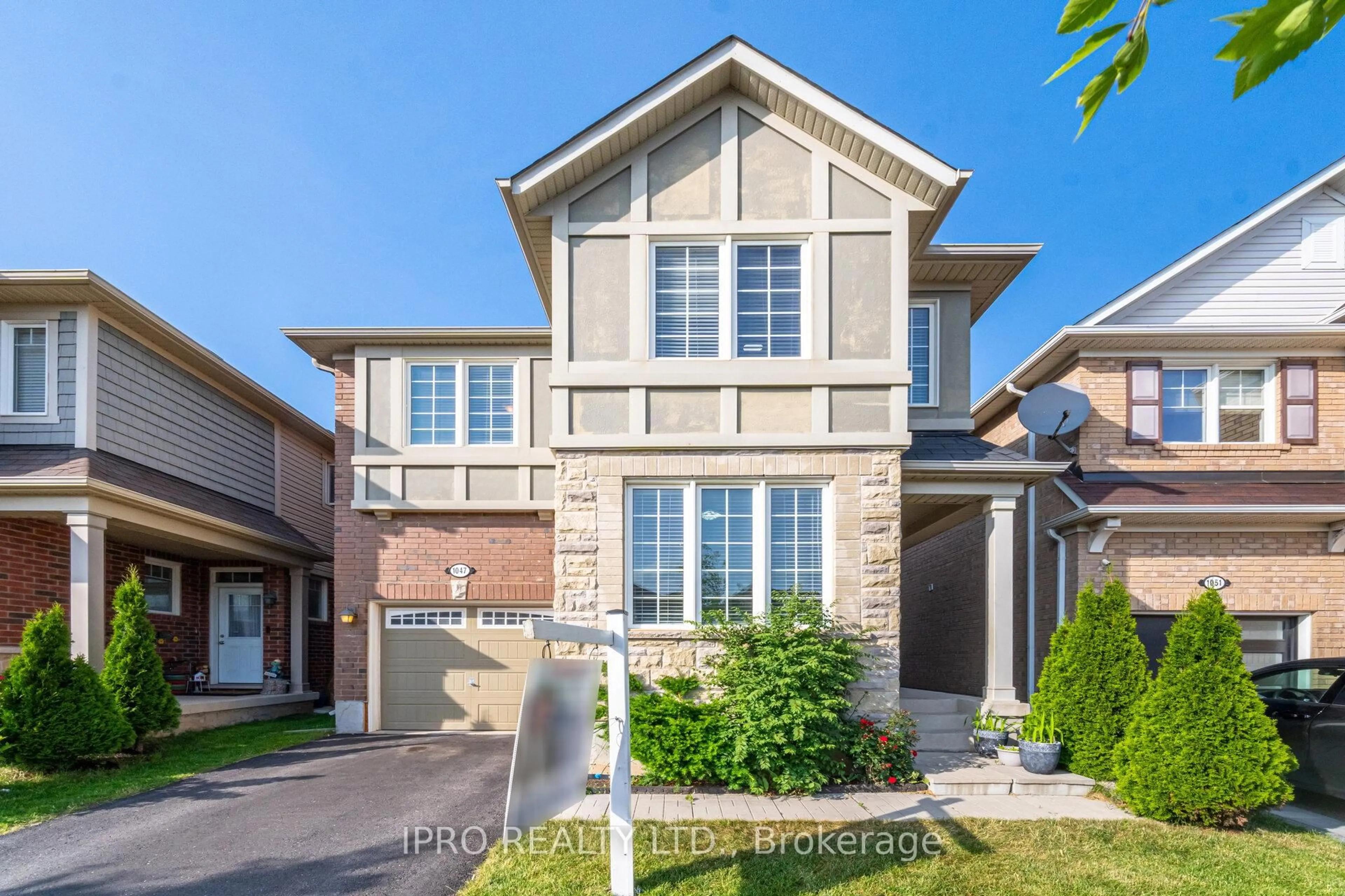 Home with brick exterior material, street for 1047 Savoline Blvd, Milton Ontario L9T 8P2