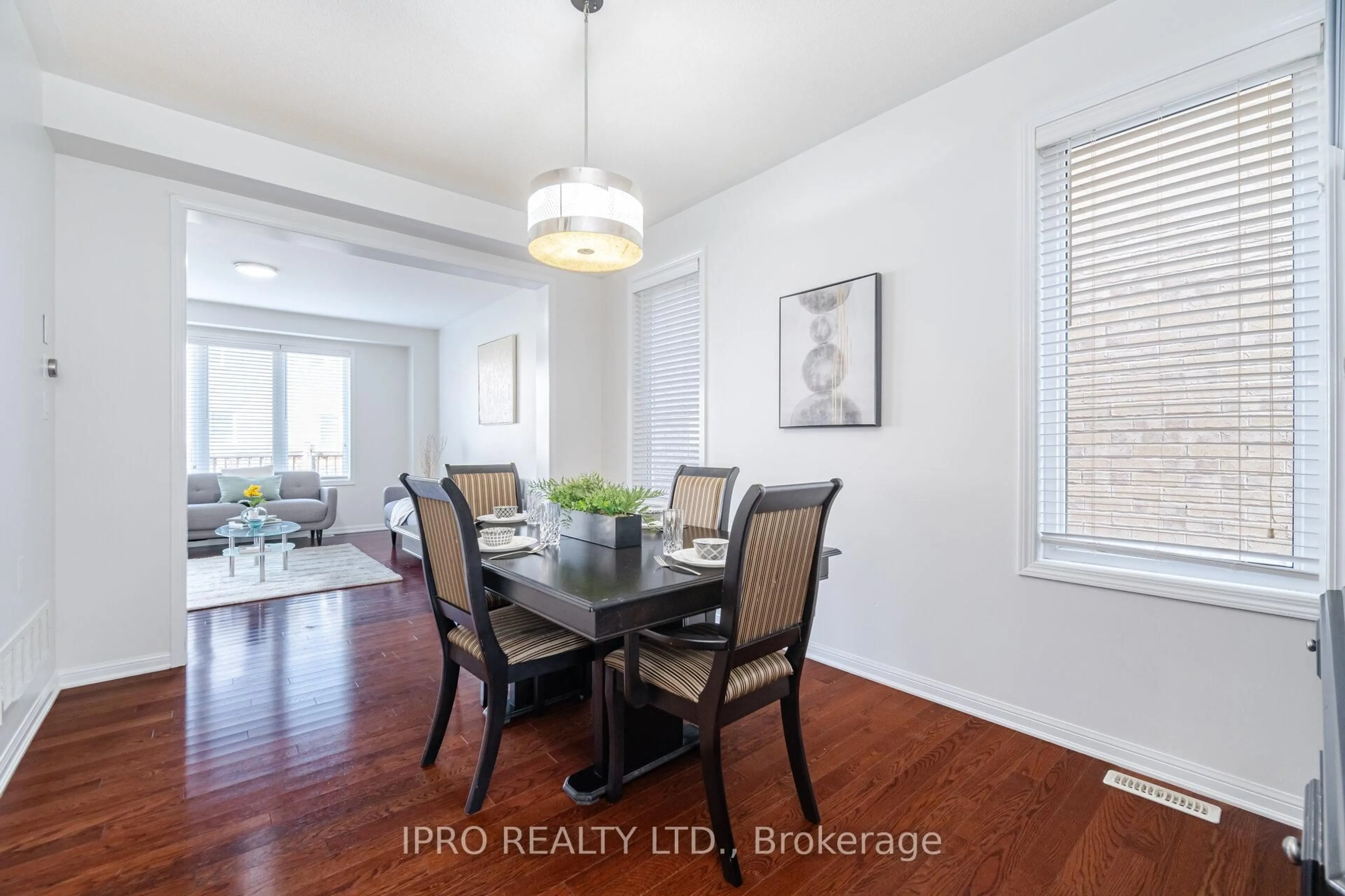 Dining room, wood/laminate floor for 1047 Savoline Blvd, Milton Ontario L9T 8P2