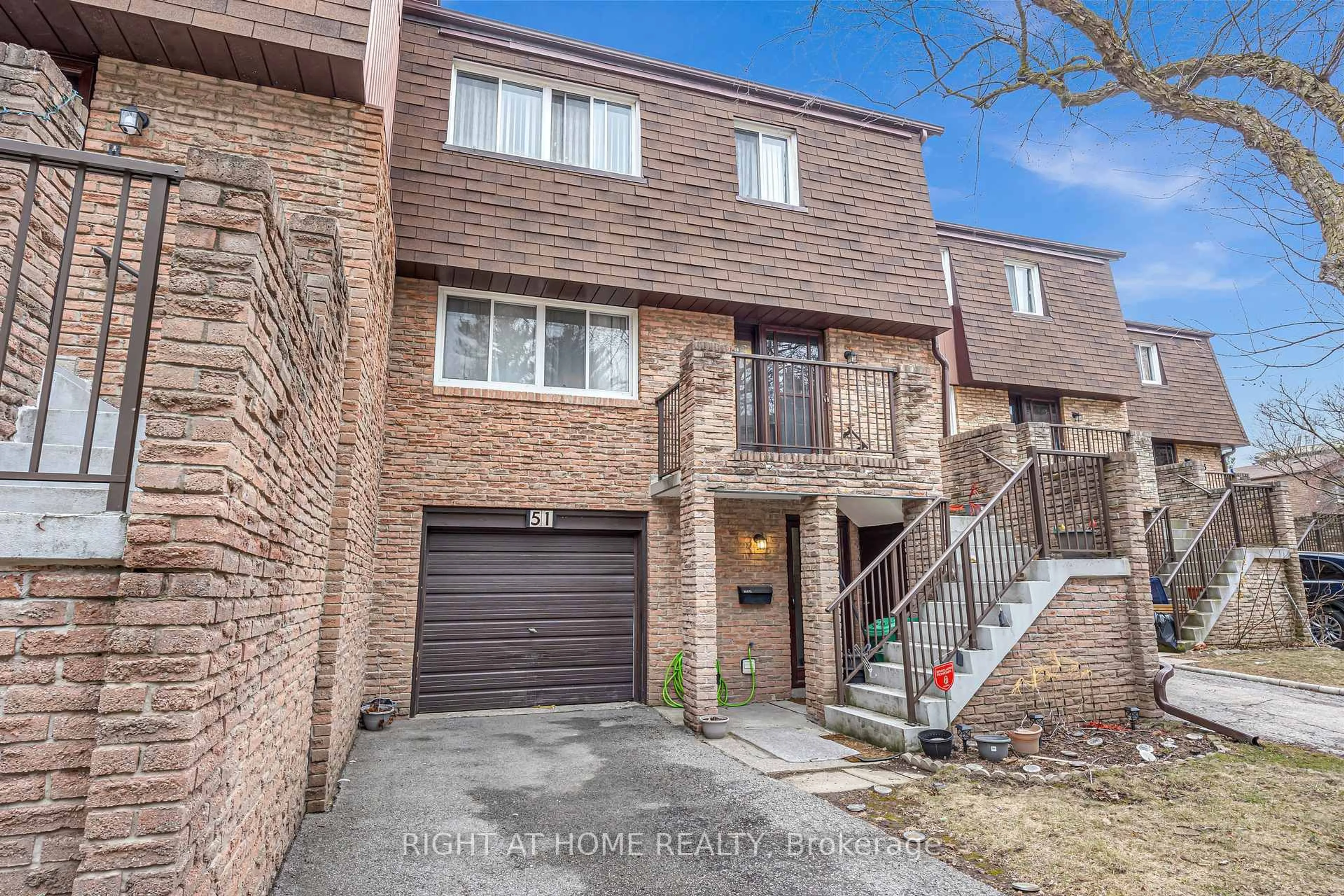 Home with brick exterior material, street for 7030 Copenhagen Rd #51, Mississauga Ontario L5N 2P3