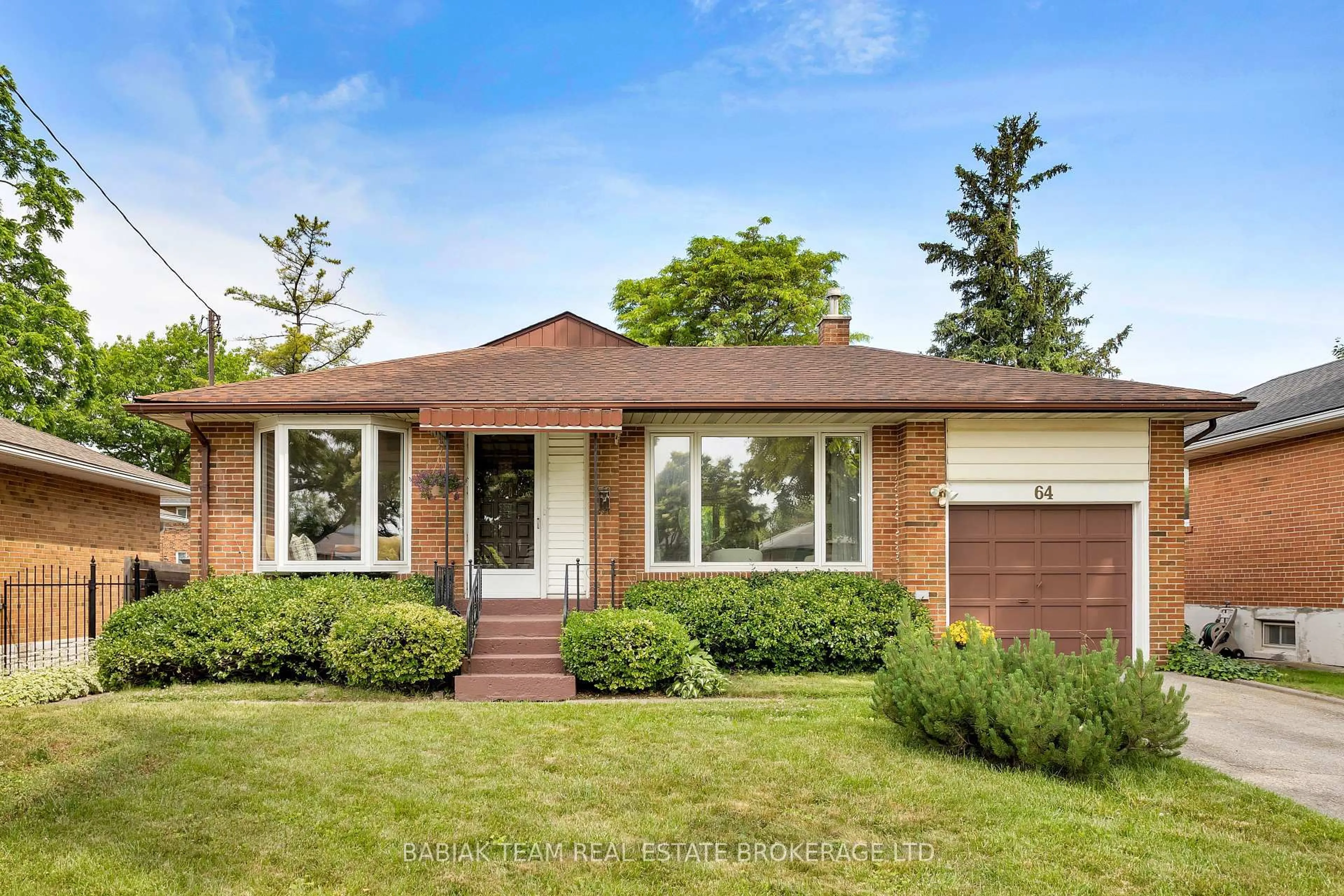 Home with brick exterior material, street for 64 Mooreshead Dr, Toronto Ontario M9C 2S3