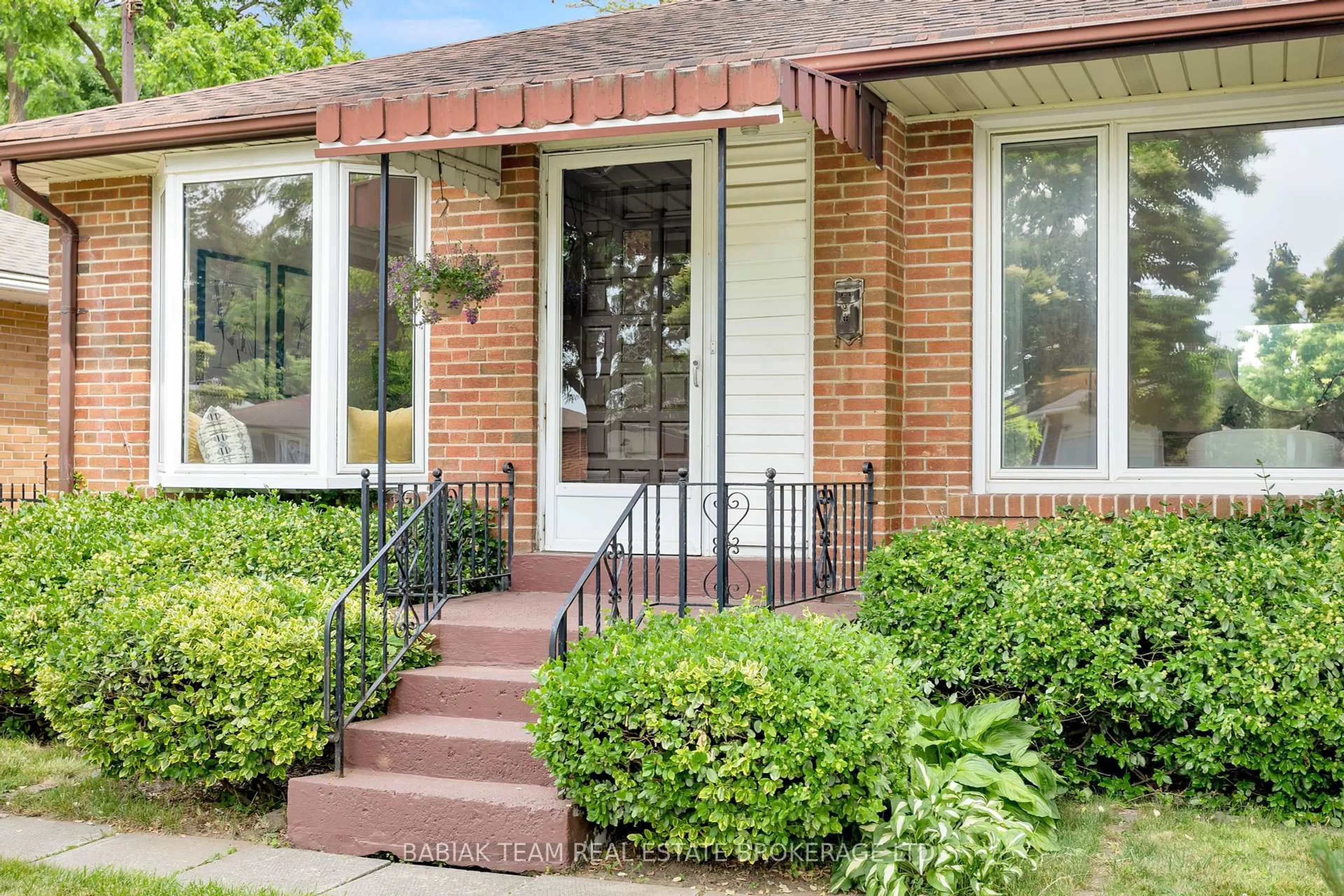 Home with brick exterior material, street for 64 Mooreshead Dr, Toronto Ontario M9C 2S3
