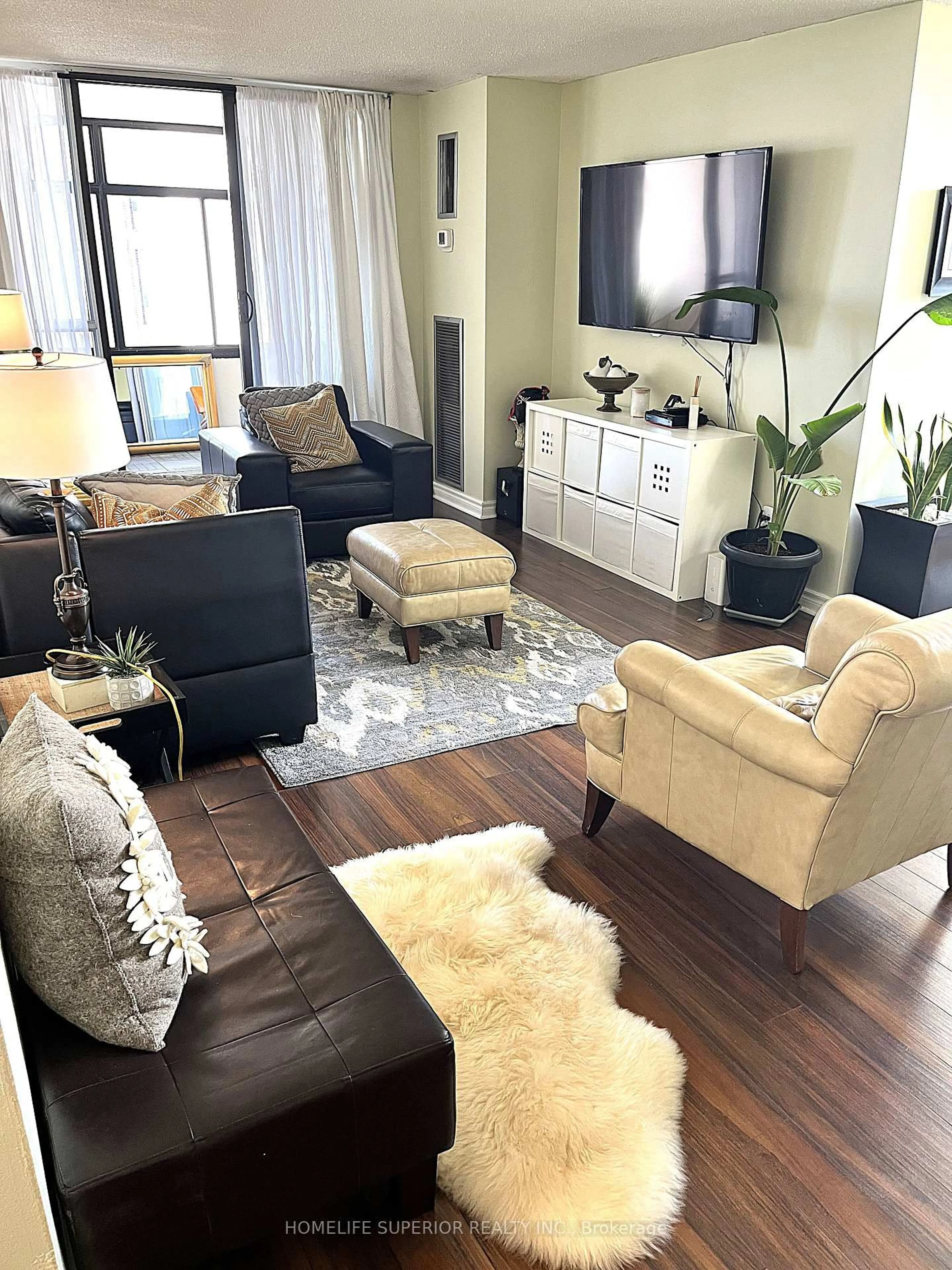 Living room with furniture, unknown for 25 Kensington Rd #1011, Brampton Ontario L6T 3W8