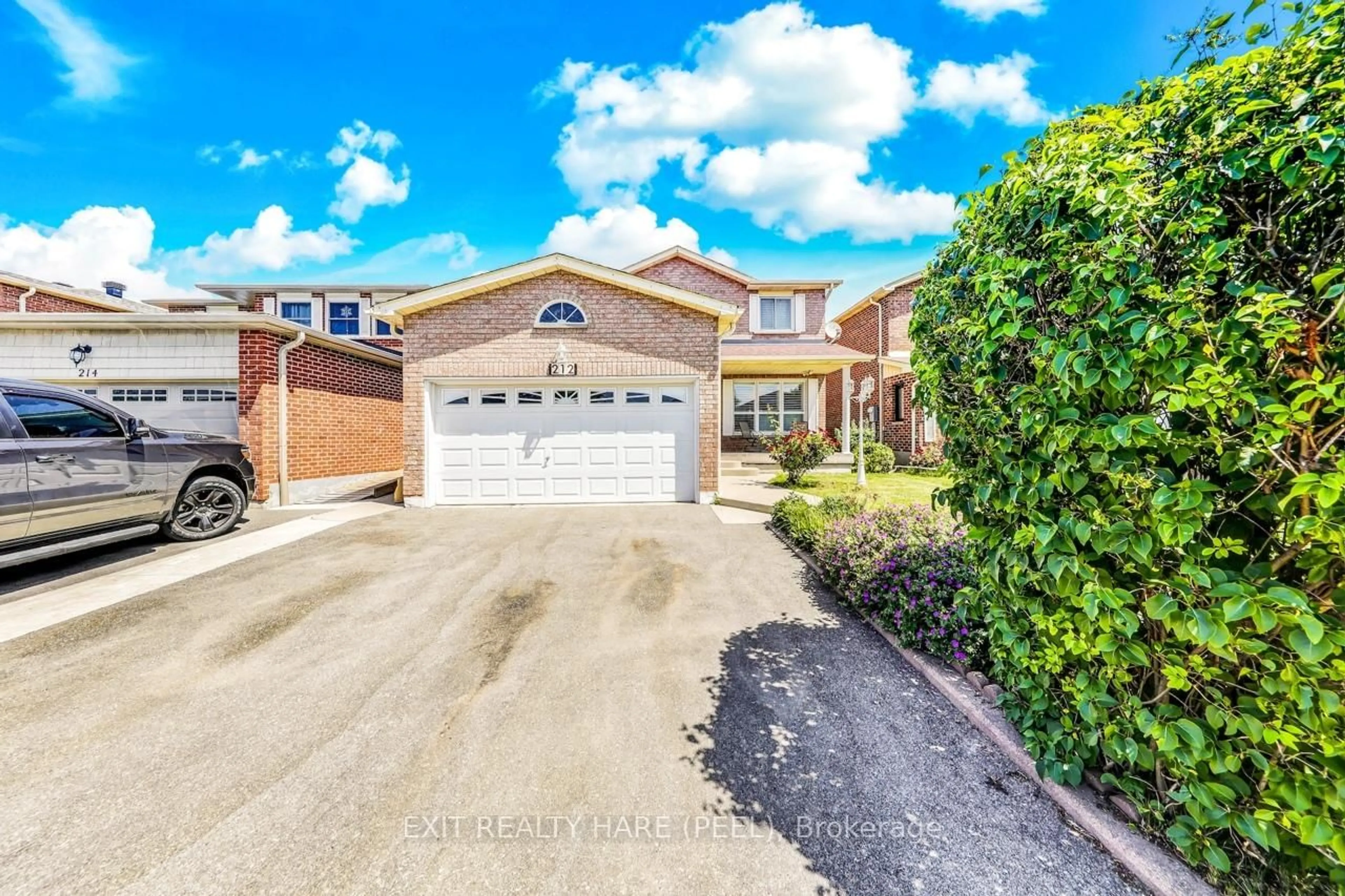 A pic from outside/outdoor area/front of a property/back of a property/a pic from drone, street for 212 Vodden St, Brampton Ontario L6X 2V3