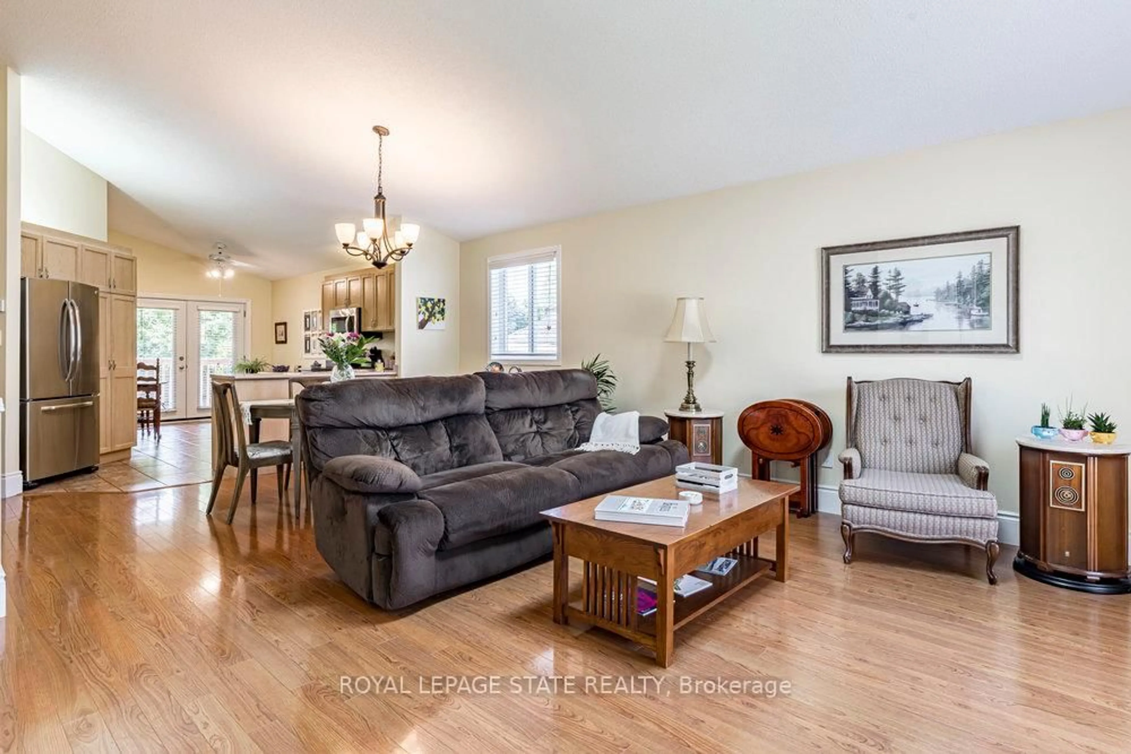 Living room with furniture, wood/laminate floor for 1510 Norwood Ave, Burlington Ontario L7T 1V8
