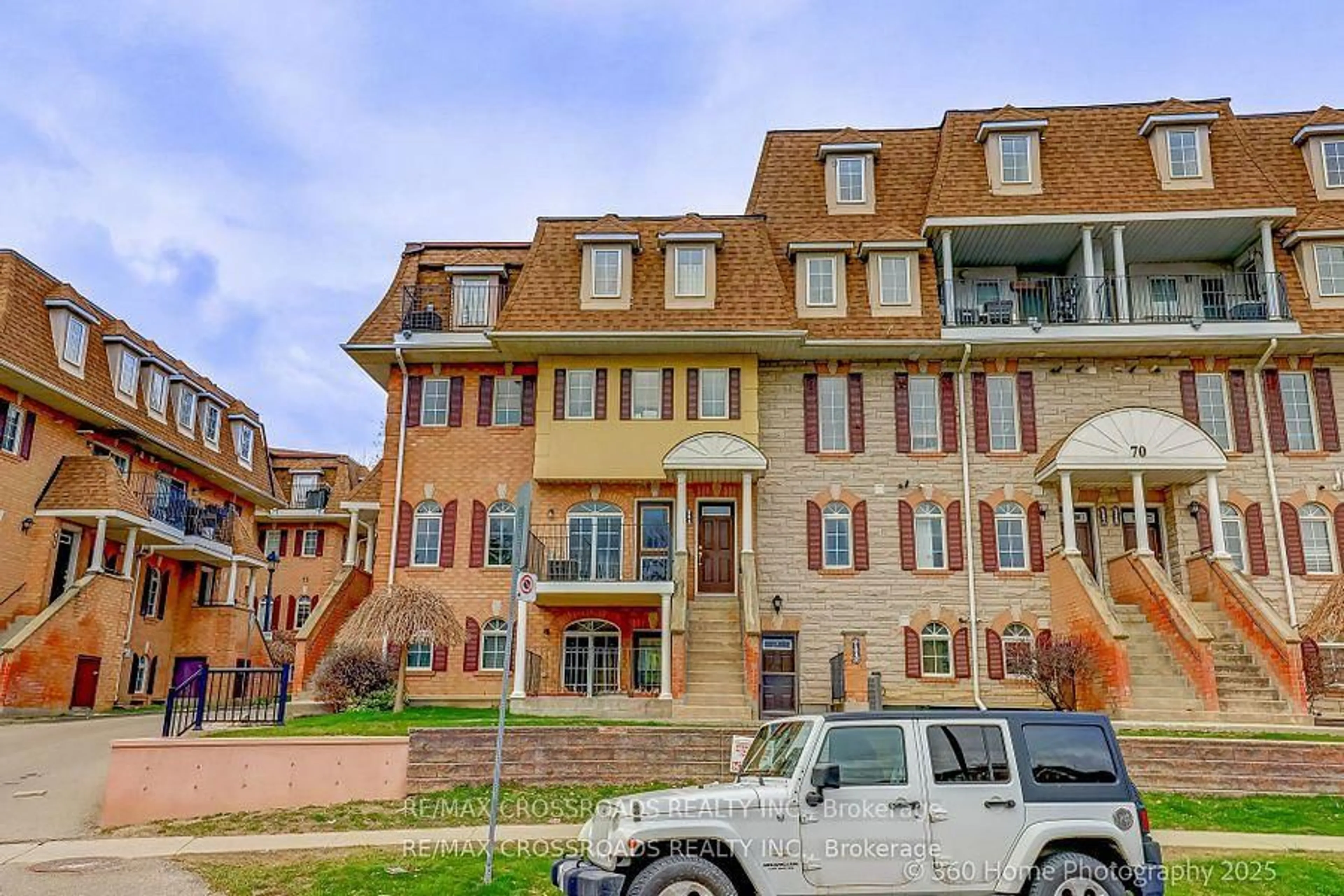 Home with brick exterior material, street for 70 Sidney Belsey Cres #204, Toronto Ontario M6M 5J5