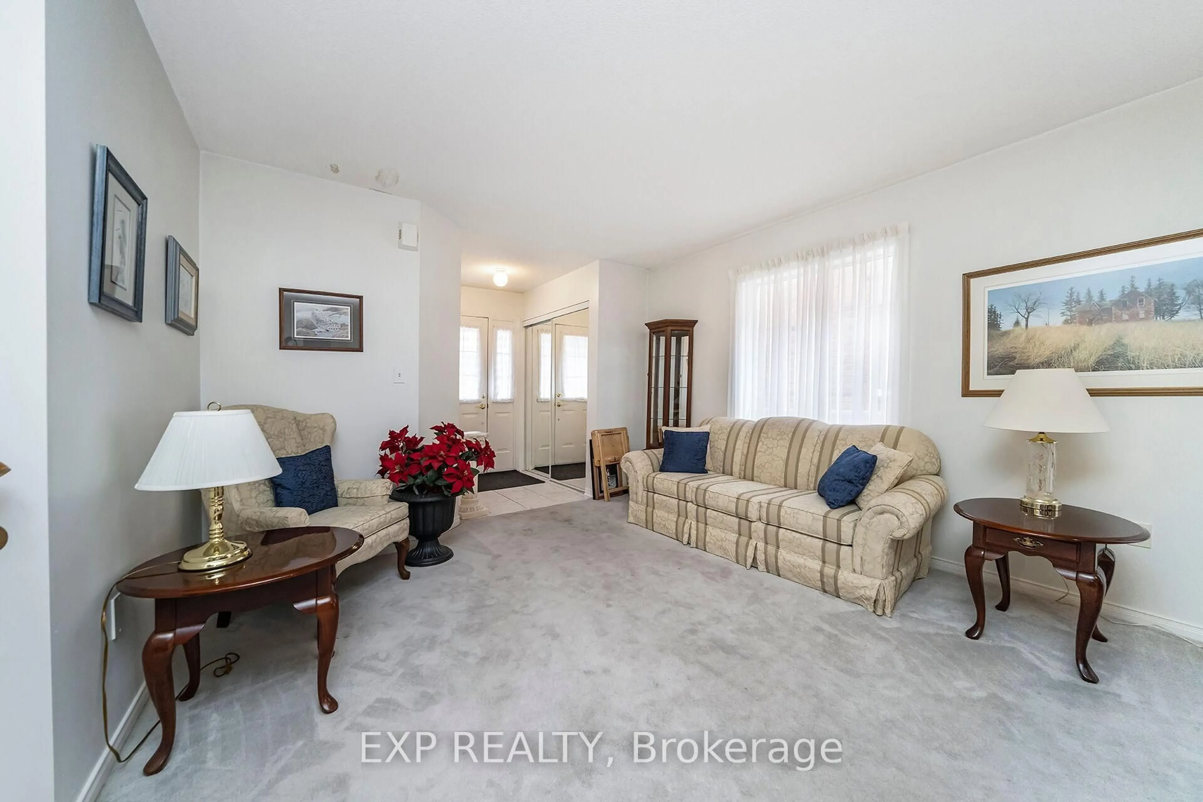 Living room with furniture, ceramic/tile floor for 98 Merganser Cres, Brampton Ontario L6W 4G4