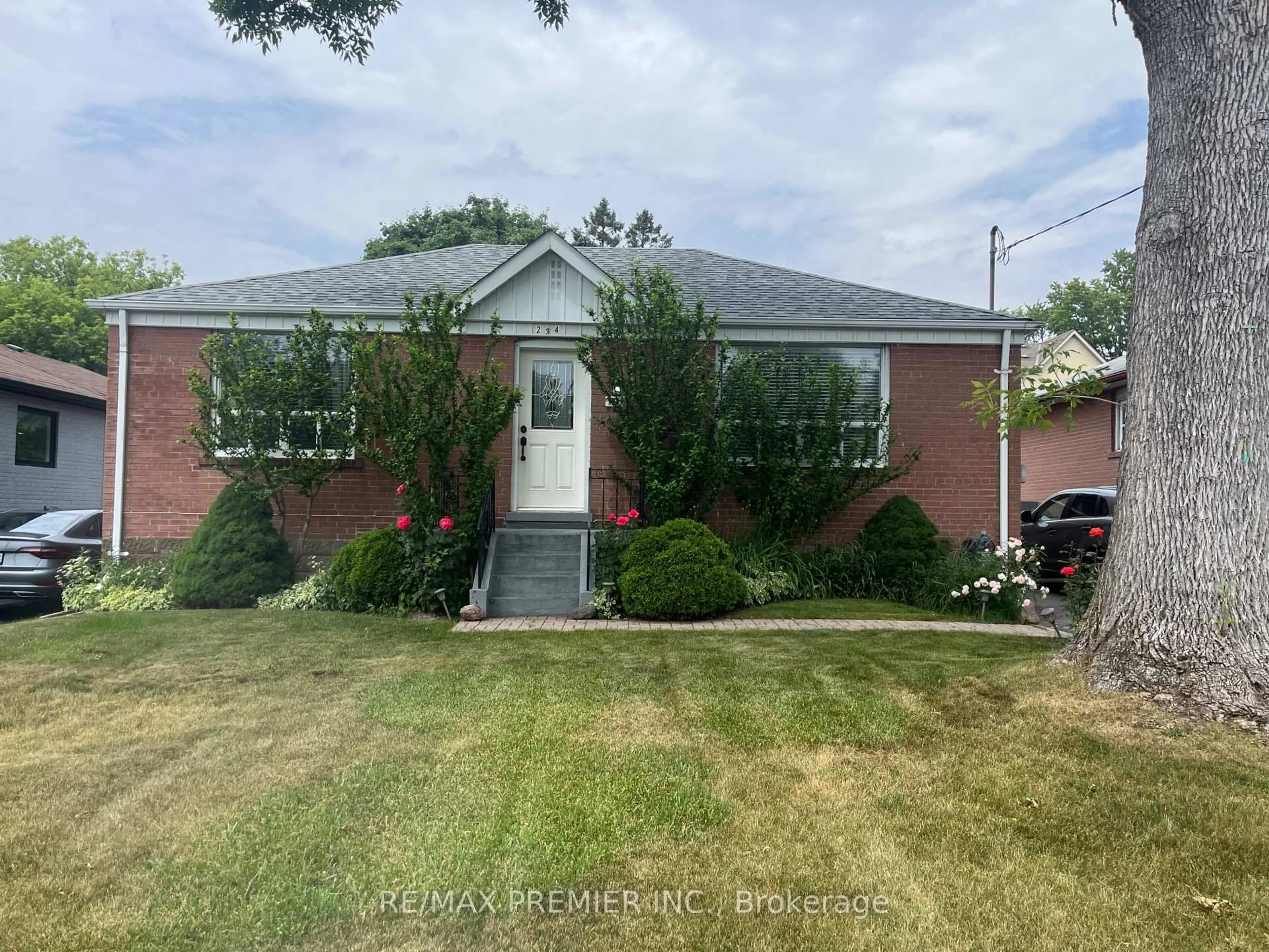 Home with brick exterior material, street for 234 Epsom Downs Dr, Toronto Ontario M3M 1T4
