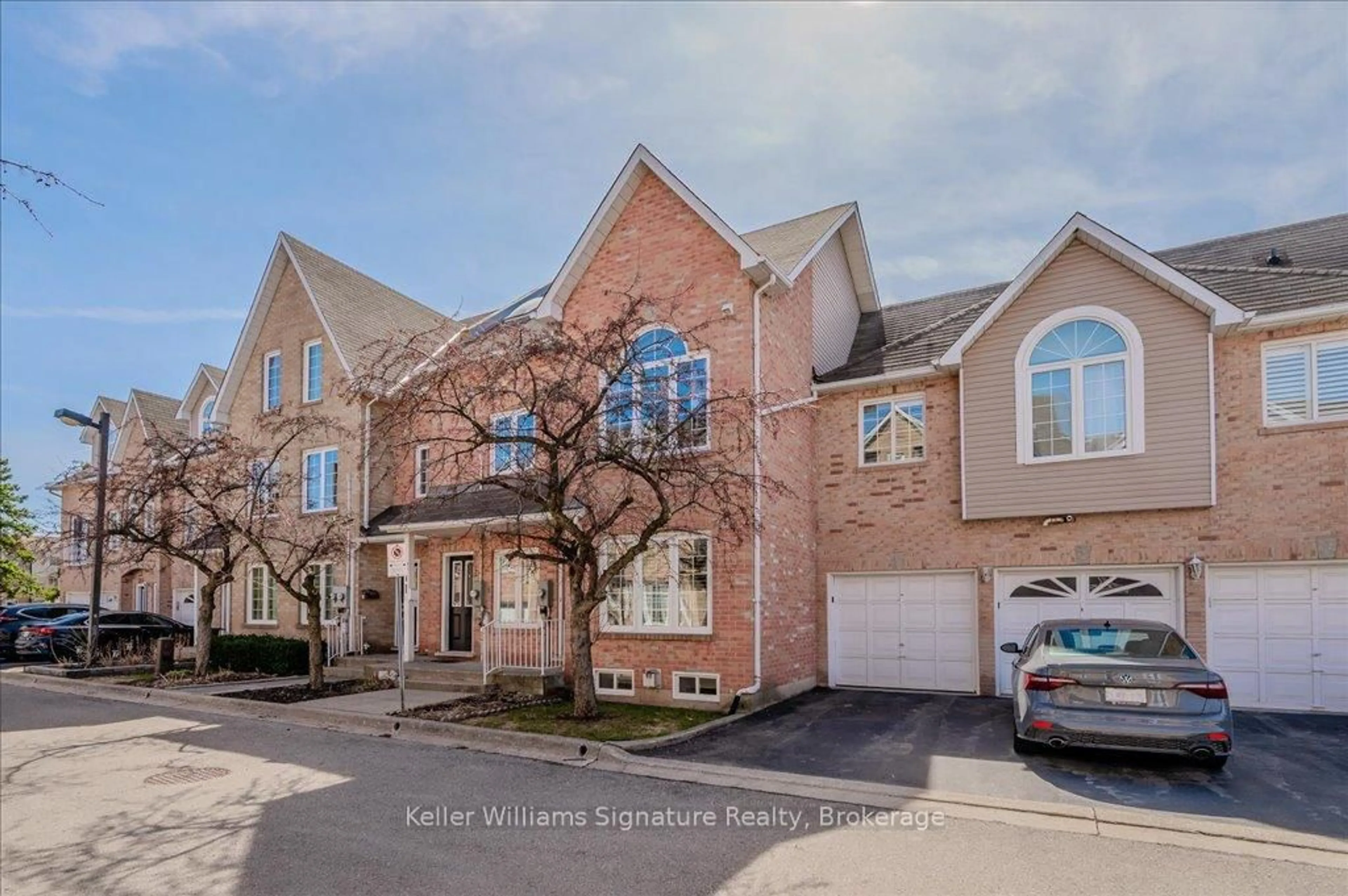 Home with brick exterior material, street for 2055 Walkers Line #105, Burlington Ontario L7M 4B5