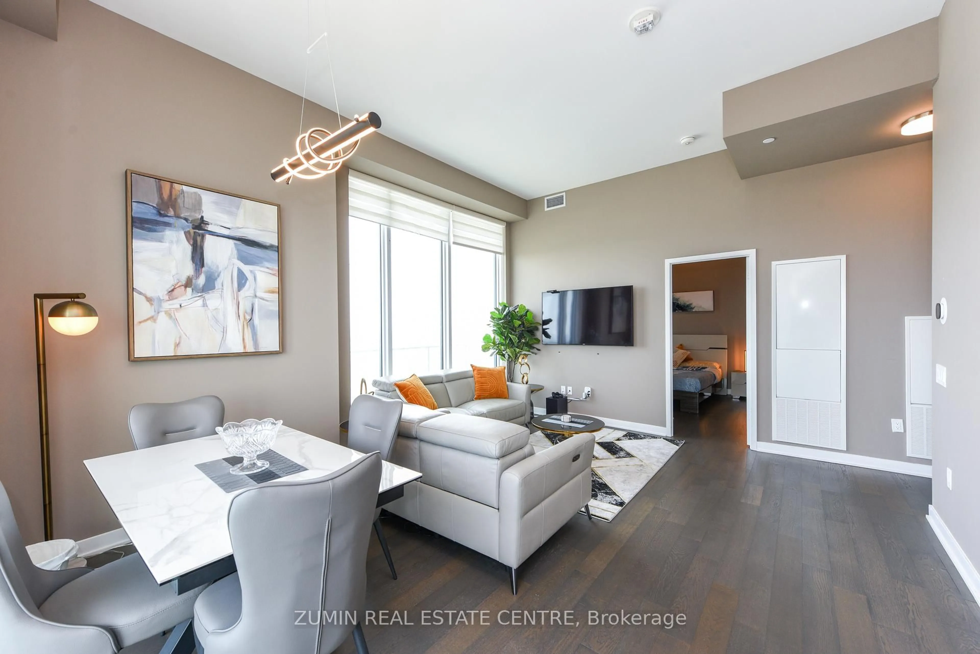 Living room with furniture, unknown for 3900 Confederation Pkwy #5907, Mississauga Ontario L5B 0M3